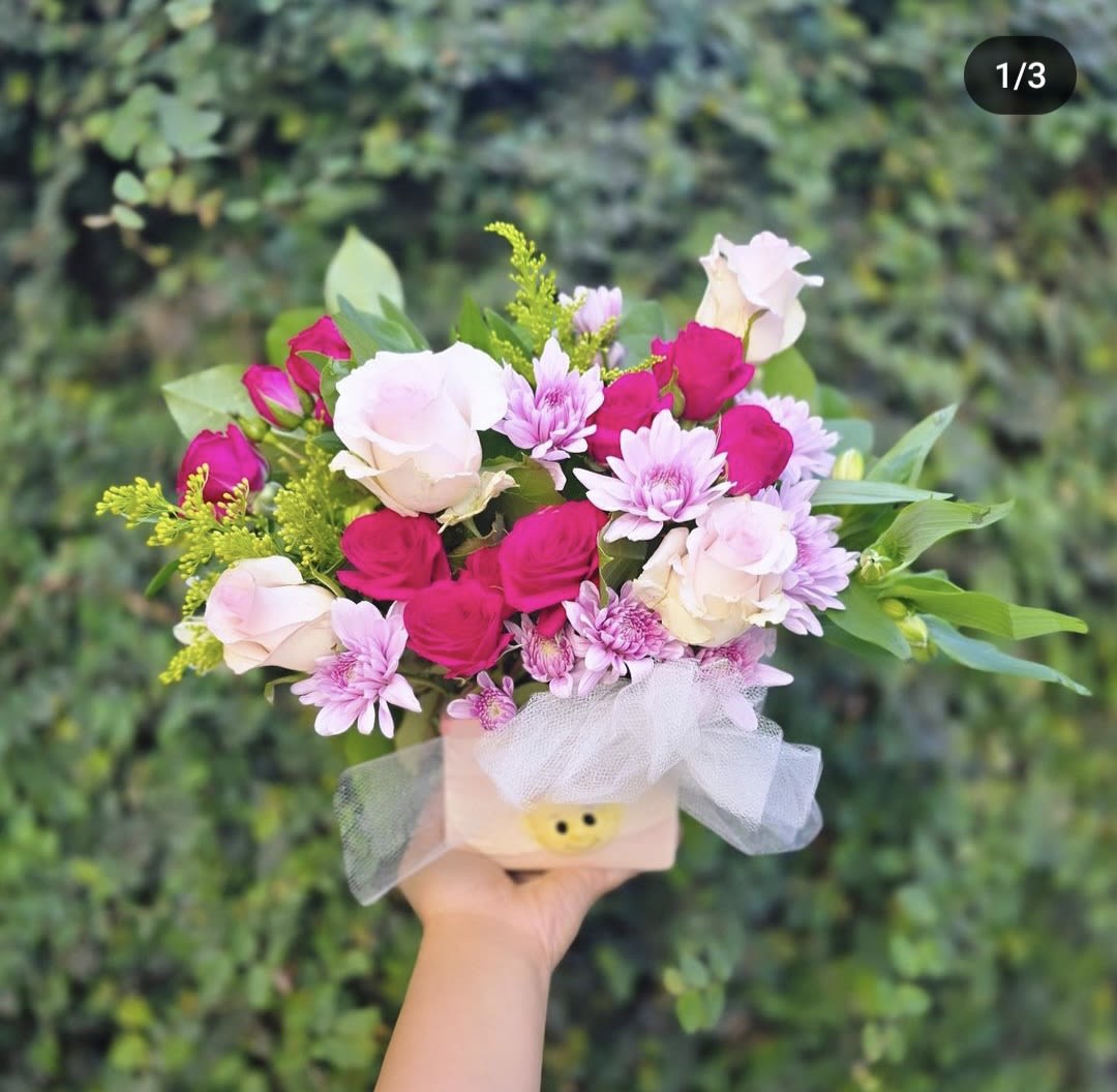 Welcome Home Baby GIrl - This all Pink Arrangement in a Baby Girl Ceramic vase is perfect to congratulate the parents of a New born girl! What a better way to welcome home Our precious newborn family members than with a refreshing bouquet designed just for them. This design features pink roses and Alstroemeria. And is accented with a matching pink ribbon.  Our standard size is designed around 5 roses Our deluxe size is designed around 7 roses Our Premium size is designed around 9 roses  popular substitutions for this item include pink florals of the following variety, lilies, Snap dragon, Hydrangea, spray roses, Daisies, and Tulips! We guarantee your Welcome Home Baby Girl Arrangement will be beautiful as can be!