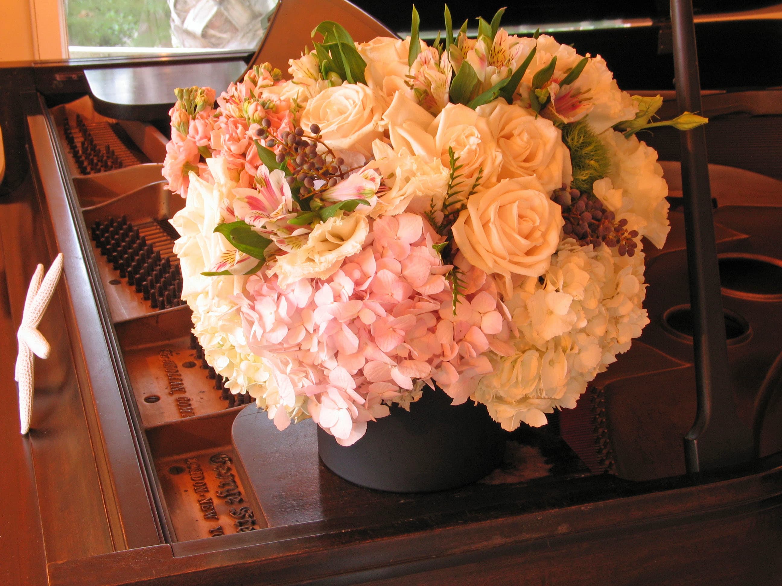 149 Floral Assortment - Fresh Floral Cylinder Arrangement from T'sul Custom Floral Design in Newport Beach, CA  Experience the beauty of nature with our exquisite cylinder arrangement featuring today’s freshest flowers, available exclusively at T'sul Custom Floral Design in Newport Beach, CA. This stunning arrangement showcases a vibrant mix of seasonal blooms, hand-selected for their freshness and beauty, making it a perfect accent for any occasion.  Our elegant floral cylinder is designed to enhance your home, office, or special event with a burst of color and fragrance. Ideal for dining tables, coffee tables, or as a thoughtful gift for loved ones, this arrangement is guaranteed to bring joy and elegance to any space.  Key Features:  Cylinder arrangement filled with the freshest flowers from the market Perfect for home decor, corporate events, or special occasions Customizable options available to suit your color palette and floral preferences Locally sourced blooms ensure premium quality and freshness Brighten up your surroundings with T'sul Custom Floral Design’s fresh floral cylinder arrangement. Order now and enjoy the vibrant beauty of expertly arranged seasonal flowers delivered right to your doorstep in Newport Beach!