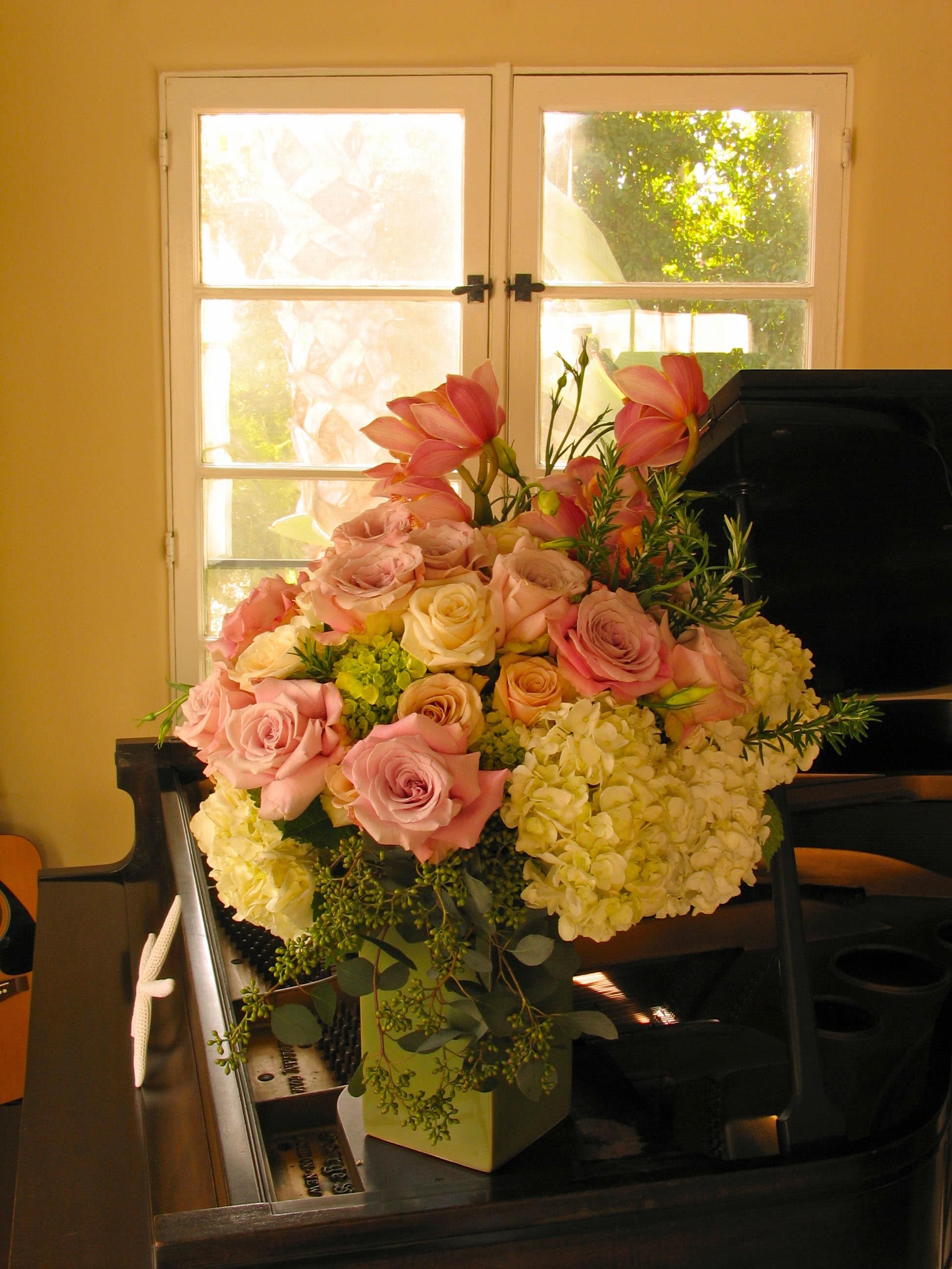 159 rose multi - Tall Rose Multi Arrangement with Hydrangea from T'sul Custom Floral Design in Newport Beach, CA  Elevate your floral decor with our stunning Tall Rose Multi Arrangement featuring luxurious roses and elegant hydrangea, available exclusively at T'sul Custom Floral Design in Newport Beach, CA. This breathtaking arrangement is designed to add height and sophistication to any space, making it the perfect choice for weddings, special events, or as a striking centerpiece for your home.  Our Tall Rose Multi Arrangement showcases a vibrant mix of fresh, premium roses complemented by lush hydrangea, creating a visually stunning and aromatic display. Whether you’re celebrating a milestone or simply wishing to enhance your living area, this arrangement is sure to impress.  Key Features:  Tall arrangement highlights beautifully arranged roses and hydrangea Perfect for home decor, corporate events, weddings, or gift-giving Customizable color options to match your personal style and occasion Crafted with locally sourced, fresh flowers ensuring premium quality Bring elegance and charm to your Newport Beach space with T'sul Custom Floral Design’s Tall Rose Multi Arrangement with Hydrangea. Order now to experience the beauty and freshness of expertly arranged flowers delivered right to your doorstep!