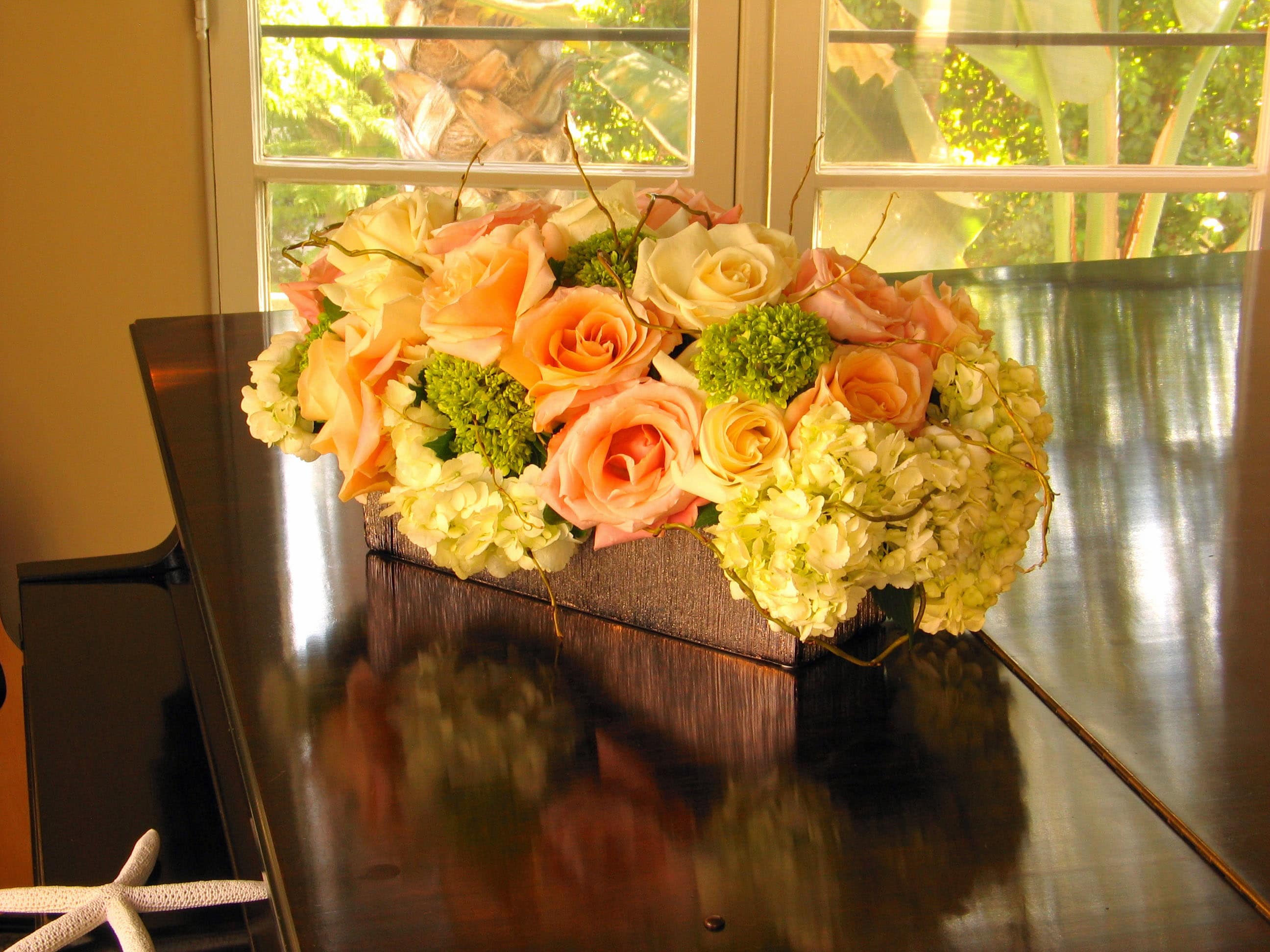 159 Multi rectangle colorburst 159 Multi rectangle colorburst - Beautiful Mixed Floral Arrangement in Rectangular Vase from T'sul Custom Floral Design in Newport Beach, CA Enhance your space with a stunning mixed floral arrangement presented in an elegant rectangular vase, exclusively from T'sul Custom Floral Design in Newport Beach, CA. This eye-catching display features a harmonious blend of multiple flowers, showcasing vibrant colors and varied textures to create a captivating centerpiece for any occasion. Perfect for brightening your home, office, or special event, our mixed floral arrangement is crafted with the freshest, high-quality blooms, ensuring a long-lasting and beautiful presentation. Whether you’re celebrating a wedding, honoring an anniversary, or simply adding a touch of nature to your decor, this arrangement makes a perfect statement piece. Key Features: A diverse selection of fresh flowers arranged in a stylish rectangular vase Ideal for home decor, corporate events, or as a thoughtful gift Crafted with premium-quality blooms for lasting beauty and fragrance Customizable options available to match your specific color preferences Transform your Newport Beach environment with a gorgeous mixed floral arrangement in a rectangular vase from T'sul Custom Floral Design. Order today to bring the beauty of fresh flowers into your life!