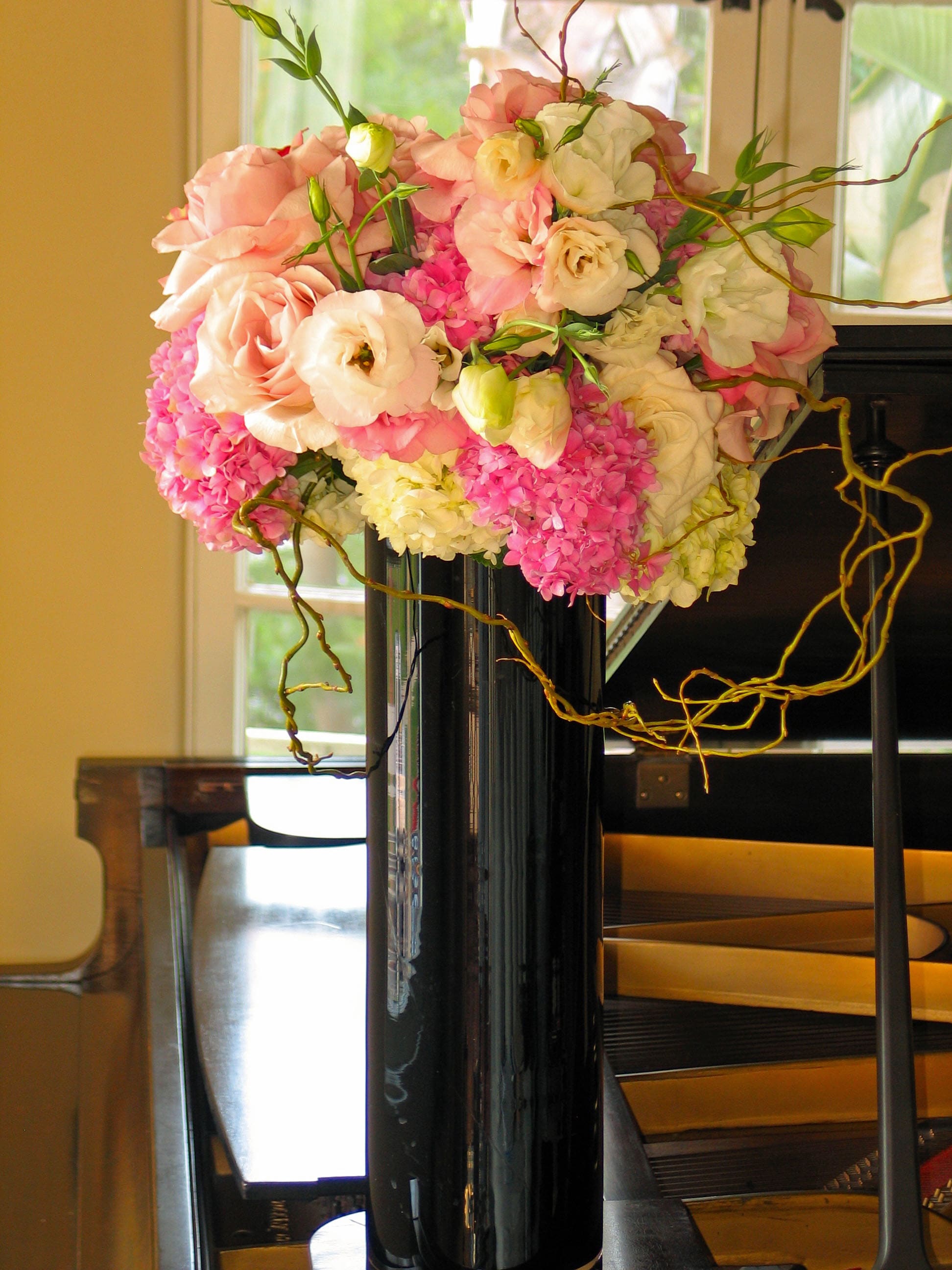 199 Tall multifloral cylinder - Multicolored, Multi-floral Cylinder Arrangement from T'sul Custom Floral Design in Newport Beach, CA  Add a burst of color to your decor with our stunning Multicolored Multifloral Cylinder Arrangement, featuring the freshest flowers sourced from this morning's market. Exclusively designed by T'sul Custom Floral Design in Newport Beach, CA, this vibrant arrangement showcases a beautiful variety of seasonal blooms, making it the perfect centerpiece for any occasion.  Ideal for brightening up your home, office, or special events, our multifloral cylinder is crafted to create a captivating display that captures attention and brings joy. Each flower is selected for its freshness and vivid color, ensuring a delightful presentation that lasts.  Key Features:  Gorgeous multicolored arrangement featuring a diverse selection of fresh flowers Perfect for home decor, celebrations, or as a thoughtful gift for loved ones Carefully arranged in a stylish cylinder to enhance any space Sourced from this morning’s market for the highest quality and freshness Transform your Newport Beach space with T'sul Custom Floral Design’s eye-catching Multicolored Multifloral Cylinder Arrangement. Order today to infuse your surroundings with the beauty of fresh, vibrant flowers!