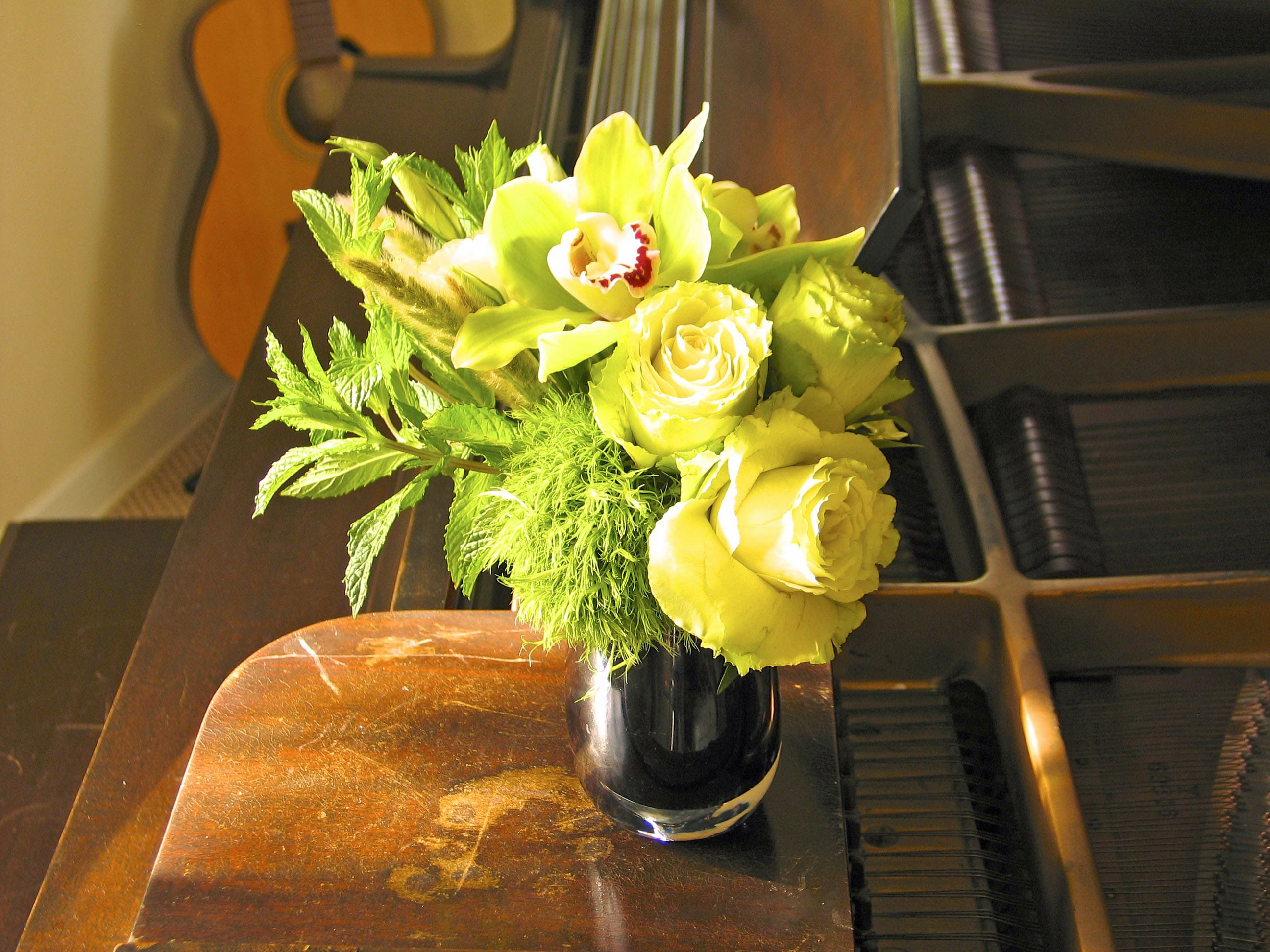69 Desk-top Orchid - Tall Orchid and Mixed Flower Arrangement in Desktop Vase from T'sul Custom Floral Design in Newport Beach, CA  Brighten your workspace with our stunning tall array of orchids and mixed flowers, expertly arranged in a stylish desktop vase, available exclusively at T'sul Custom Floral Design in Newport Beach, CA. This elegant floral display is designed to add a touch of beauty and sophistication to any office or home desk.  Featuring a vibrant selection of fresh orchids alongside a variety of seasonal blooms, this tall arrangement creates an eye-catching focal point. The thoughtful combination of colors and textures not only enhances your decor but also brings a sense of serenity and happiness to your environment.  Key Features:  Beautifully arranged tall orchids mixed with a variety of fresh seasonal flowers Perfect for desktops, office spaces, or as a thoughtful gift Crafted with high-quality, locally sourced flowers for lasting freshness and beauty Ideal for enhancing any decor style and uplifting your mood Transform your Newport Beach workspace with T'sul Custom Floral Design’s exquisite tall orchid and mixed flower arrangement in a desktop vase. Order today to enjoy the elegance and vibrancy of fresh flowers in your everyday life