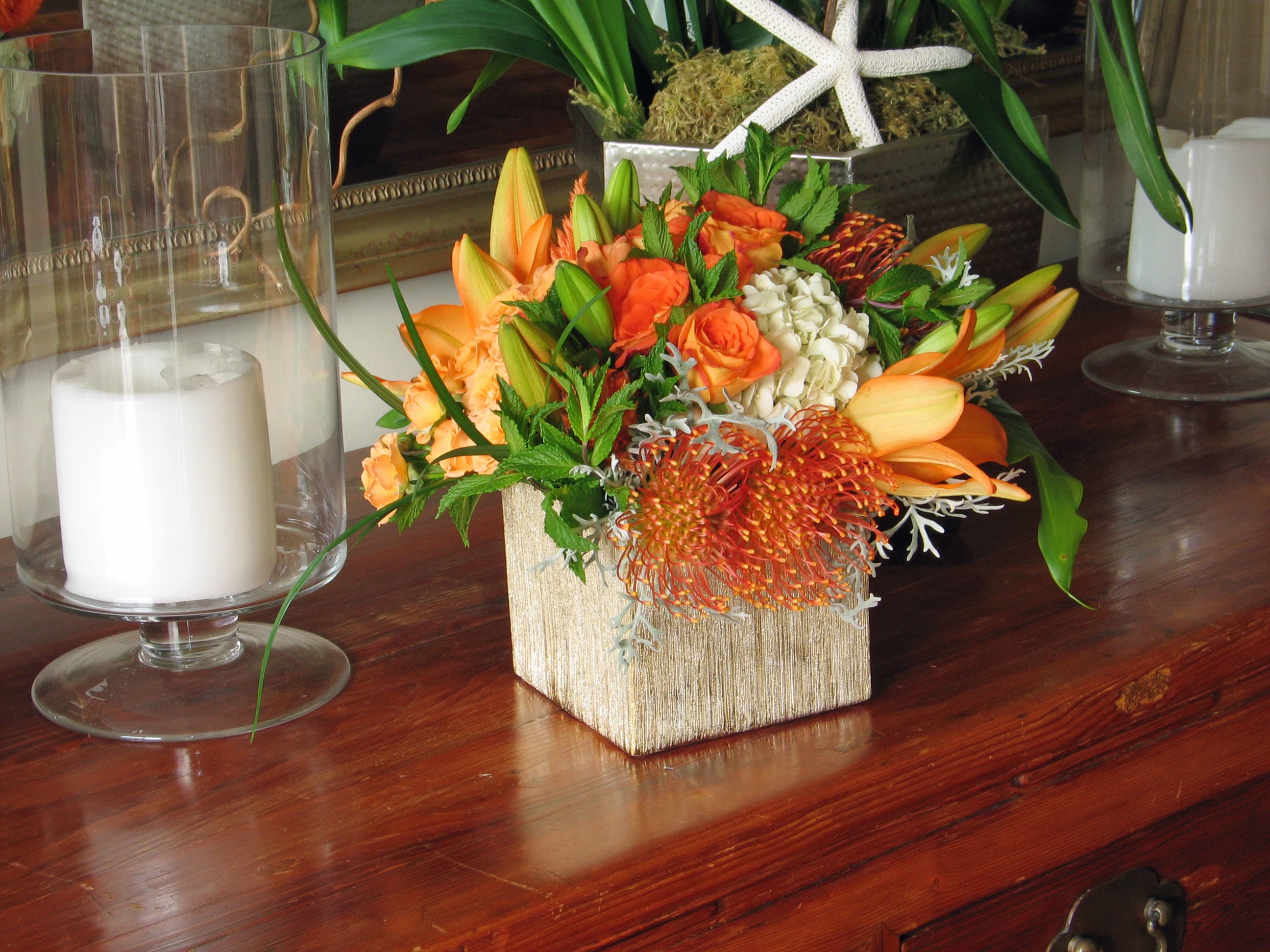 69 Exotic multi 69 Exotic multi - Exotic Multi-Floral Arrangement in Square Vase from T'sul Custom Floral Design in Newport Beach, CA Experience the beauty of our Exotic Multi-Floral Arrangement, elegantly presented in a stylish square vase, exclusively at T'sul Custom Floral Design in Newport Beach, CA. This stunning floral display is filled with the market's freshest assortment of exotic blooms, meticulously curated to create a vibrant centerpiece that adds a splash of color and sophistication to any space. Ideal for home decor, special events, or as a thoughtful gift, this exotic multi-floral arrangement features a dynamic blend of unique flowers that capture attention and evoke delight. Each arrangement is crafted with high-quality, seasonal blooms to ensure lasting freshness and beauty. Key Features: A captivating assortment of exotic flowers arranged in a chic square vase Perfect for brightening up living rooms, dining tables, or office spaces Sourced from the market’s freshest selection for quality and longevity Ideal for occasions such as weddings, parties, or as a luxurious gift Enhance your Newport Beach environment with T'sul Custom Floral Design’s exotic multi-floral arrangement in a square vase. Order today to bring the enchanting beauty of fresh flowers into your life!