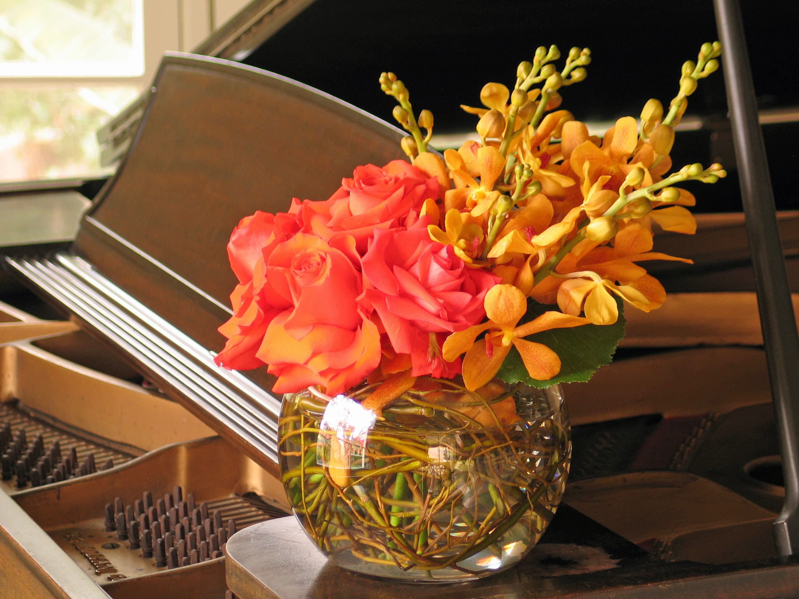 89 roses with orchid spray - Roses and Orchid Spray Arrangement in Large Bowl from T'sul Custom Floral Design in Newport Beach, CA  Enhance your floral decor with our stunning Roses and Orchid Spray Arrangement, beautifully displayed in a large bowl, exclusively from T'sul Custom Floral Design in Newport Beach, CA. This captivating arrangement showcases the elegance of lush roses complemented by delicate sprays of vibrant orchids, creating a luxurious centerpiece that will elevate any space.  Ideal for home decor, special events, or as a thoughtful gift, this arrangement combines the classic beauty of roses with the exotic allure of orchids, making it a perfect choice for weddings, anniversaries, or celebrations. The large bowl design provides ample space for the flowers to flourish, ensuring a fresh and vibrant display.  Key Features:  Beautifully arranged roses paired with striking sprays of orchids Displayed in a spacious large bowl, perfect for dining tables, entryways, or special events Ideal for home decoration, gifts, or for enhancing any occasion Crafted with fresh, high-quality blooms for lasting beauty and fragrance Transform your Newport Beach home or event with T'sul Custom Floral Design’s exquisite Roses and Orchid Spray Arrangement in a large bowl. Order today to bring the beauty of fresh flowers into your life!