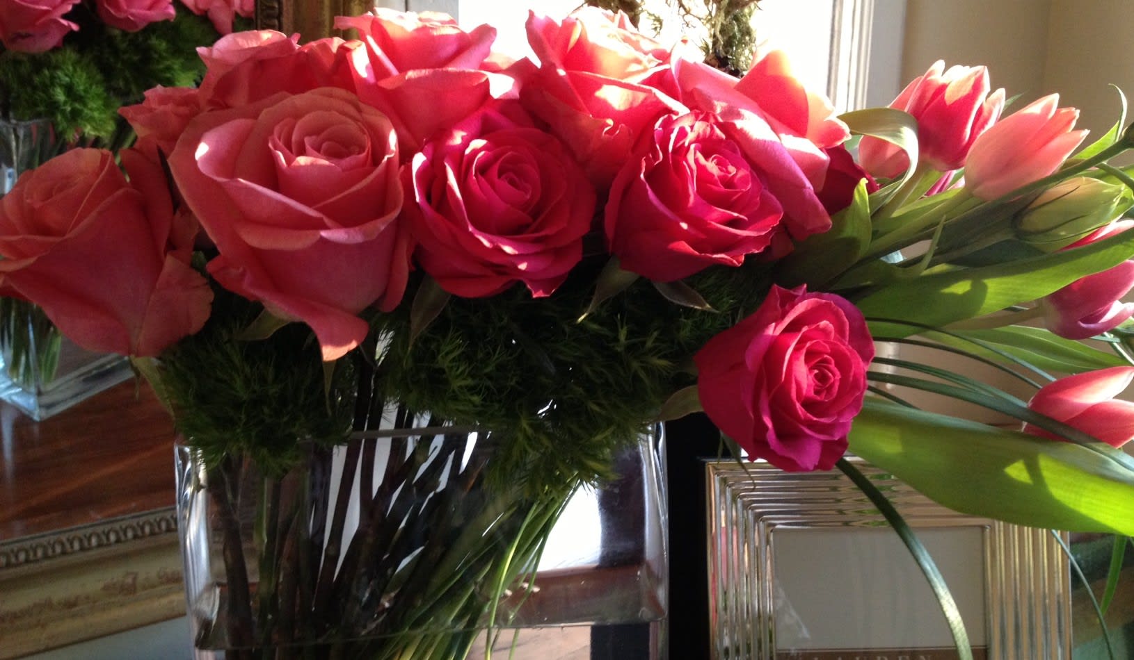 99 Roses &amp; Tulips - Roses and Tulips Arrangement from T'sul Custom Floral Design in Newport Beach, CA  Brighten anyone's day with our delightful Roses and Tulips Arrangement, exclusively designed by T'sul Custom Floral Design in Newport Beach, CA. This charming floral display combines the classic beauty of roses with the cheerful elegance of tulips, creating a stunning centerpiece that brings joy and color to any space.  Available in a variety of vibrant colors, this arrangement can be customized to match your decor or the preferences of your loved ones. Perfect for celebrations, gifts, or adding a fresh touch to your home, our Roses and Tulips arrangement is sure to impress.  Key Features:  Beautifully arranged roses and tulips that brighten up any setting Available in multiple colors to suit any occasion or personal taste Ideal for home decoration, special events, or as a thoughtful gift Crafted with the freshest locally sourced flowers for lasting beauty and fragrance Transform your Newport Beach space with T'sul Custom Floral Design’s exquisite Roses and Tulips Arrangement. Order today to spread happiness and enjoy the beauty of fresh flowers in your life!