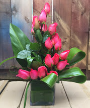 A GREAT DAY BOUQUET- ON SALE WAS $149 -  HIGHSTYLE ARRANGEMENT OF IMPORTED ROSES AND TROPICAL GREENS.