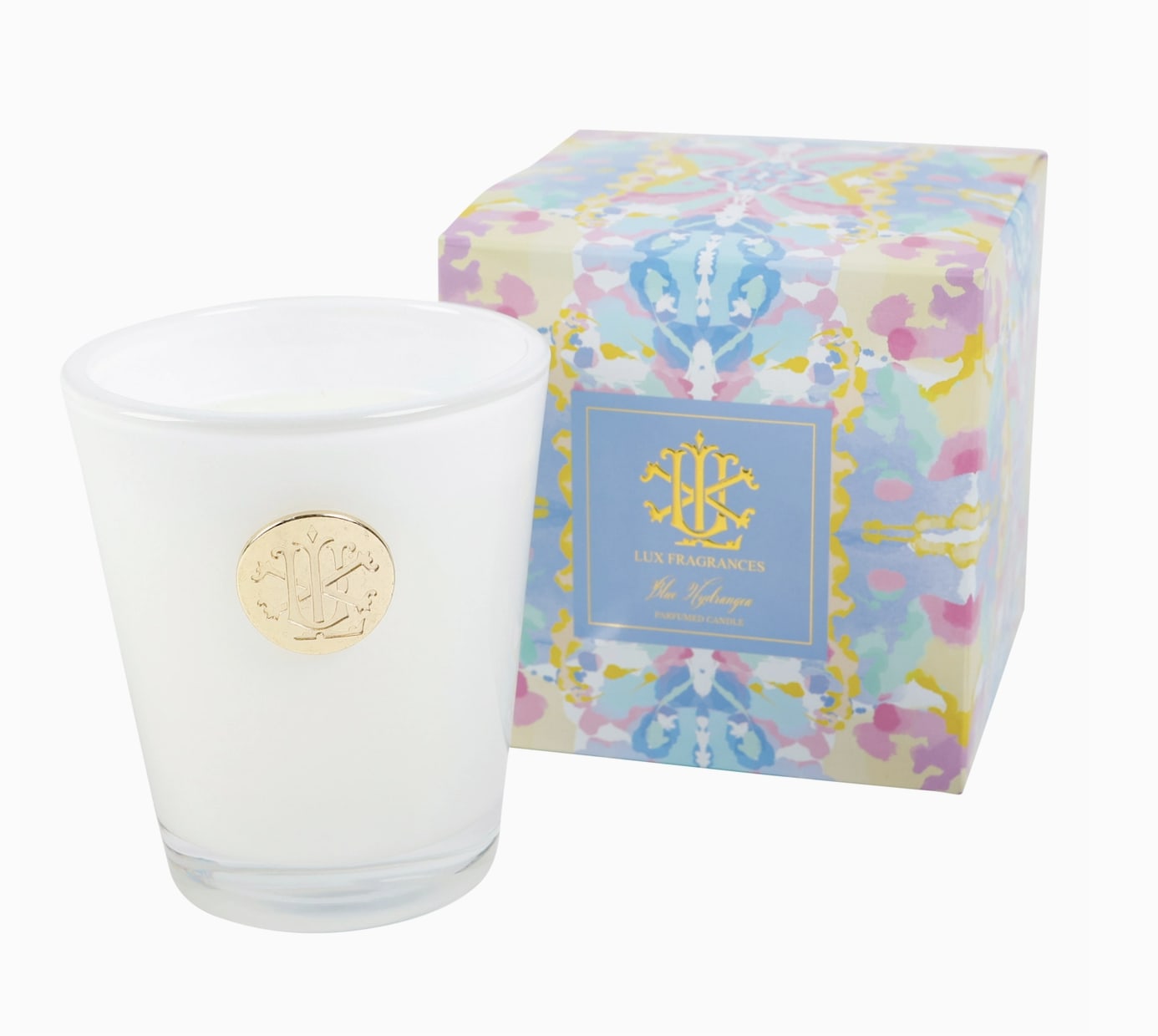 Blue Hydrangea Lux Candle  - Walk the path through a dewy spring garden with the delicate, uplifting aromas of blue hydrangea blooms. The clean and crisp bouquet of this classically floral fragrance awakens the senses while relaxing the spirit - beautiful for the sunroom on a Saturday morning or the foyer as guests arrive for dinner in the evening.