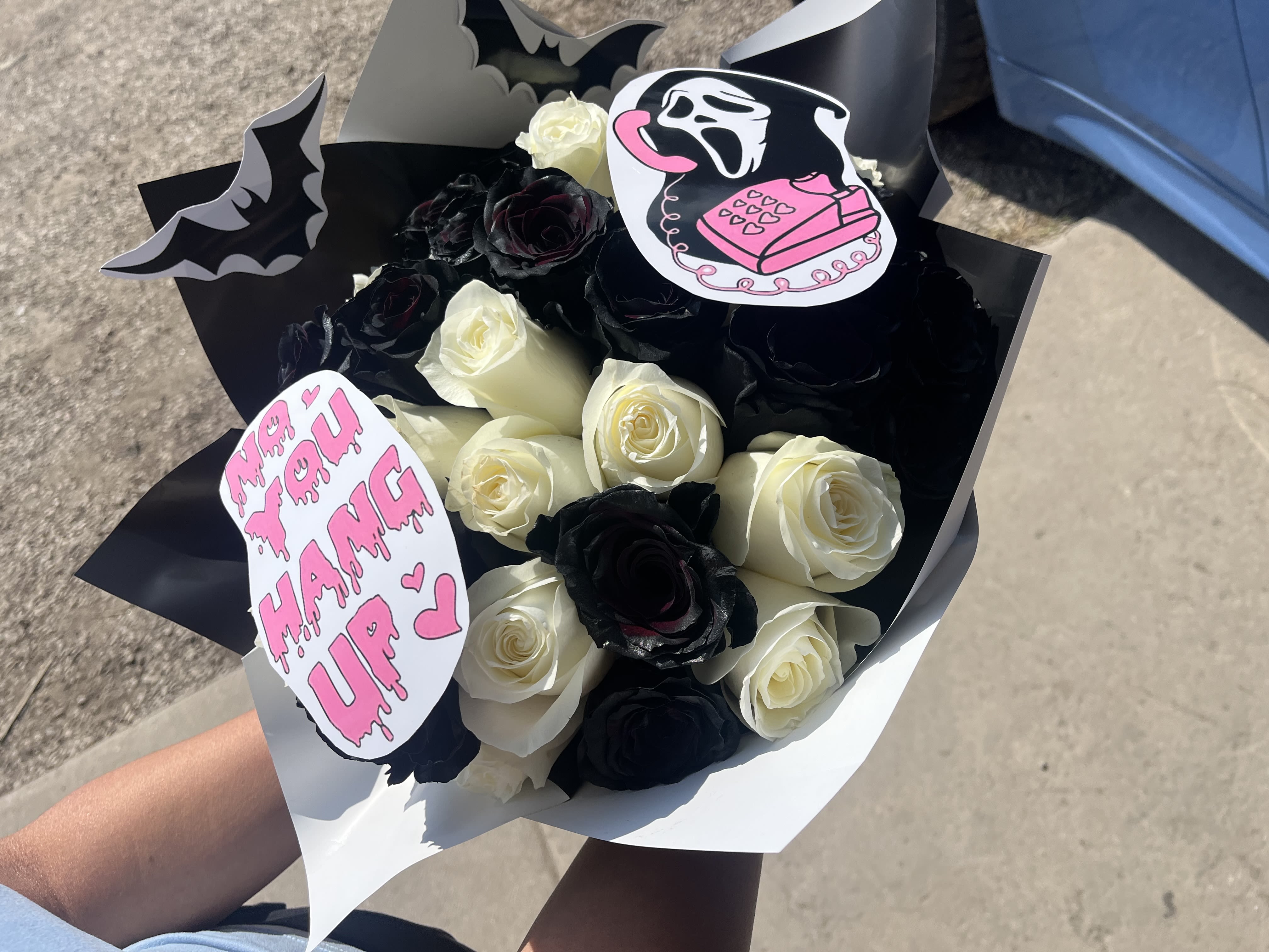Spooky Bouquet/Black and White roses - 2 dozen black and white roses, decorations are optional Perfect for Halloween! Hand Wrapped Bouquet