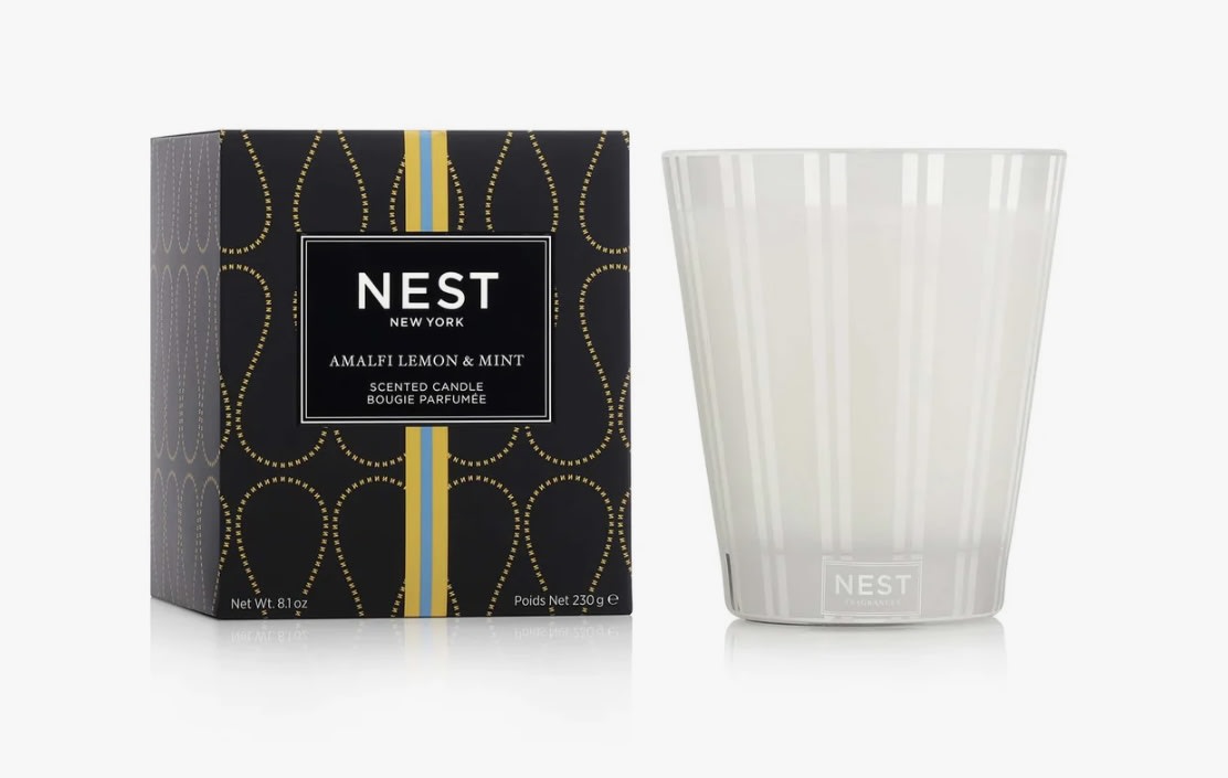 Amalfi Lemon & Mint Classic Candle Amalfi Lemon & Mint Classic Candle - Evoke the essence of Italy’s Amalfi Coast with this Classic Candle featuring zesty lemon and orange bergamot blended with fresh mint and a hint of driftwood. Overview This exquisitely fragranced Classic Candle elevates everyday living and entertaining. It is meticulously crafted with a proprietary premium wax formulated so the candle burns cleanly and evenly and infuses a room with exceptional scent. Fragrance Family Fresh Scent Type Fresh Citrus Key Notes Zesty lemon and orange bergamot blended with fresh mint and a hint of driftwood
