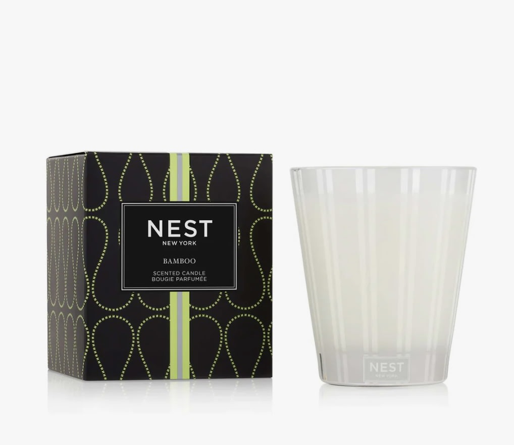 Bamboo Classic Candle Bamboo Classic Candle - Create the aroma of a welcoming garden with this bestselling fragrance, Bamboo. This Classic Candle features the iconic scent’s blend of white florals with an abundance of lush green notes and hints of sparkling citrus. Overview This exquisitely fragranced Classic Candle elevates everyday living and entertaining. It is meticulously crafted with a proprietary premium wax formulated so the candle burns cleanly and evenly and infuses a room with exceptional scent. Fragrance Family Floral Scent Type Floral-Dewy Key Notes White florals with an abundance of lush green notes and hints of sparkling citrus