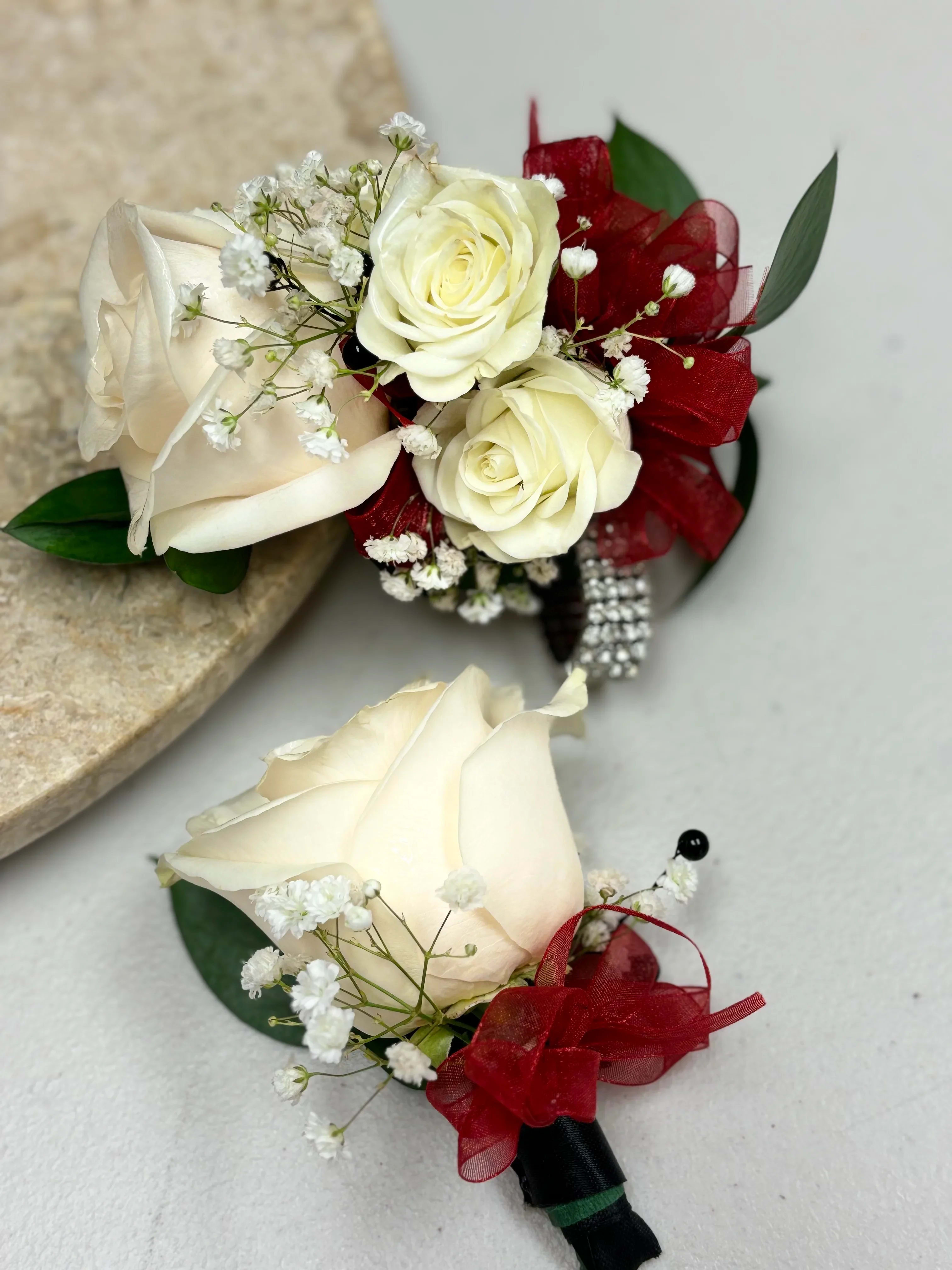 White Rose Boutonniere - Ivory rose boutonniere with ribbon color of choice. Boutonniere includes ivory rose, baby's breath and greenery. Please list color of ribbon choice in comments.