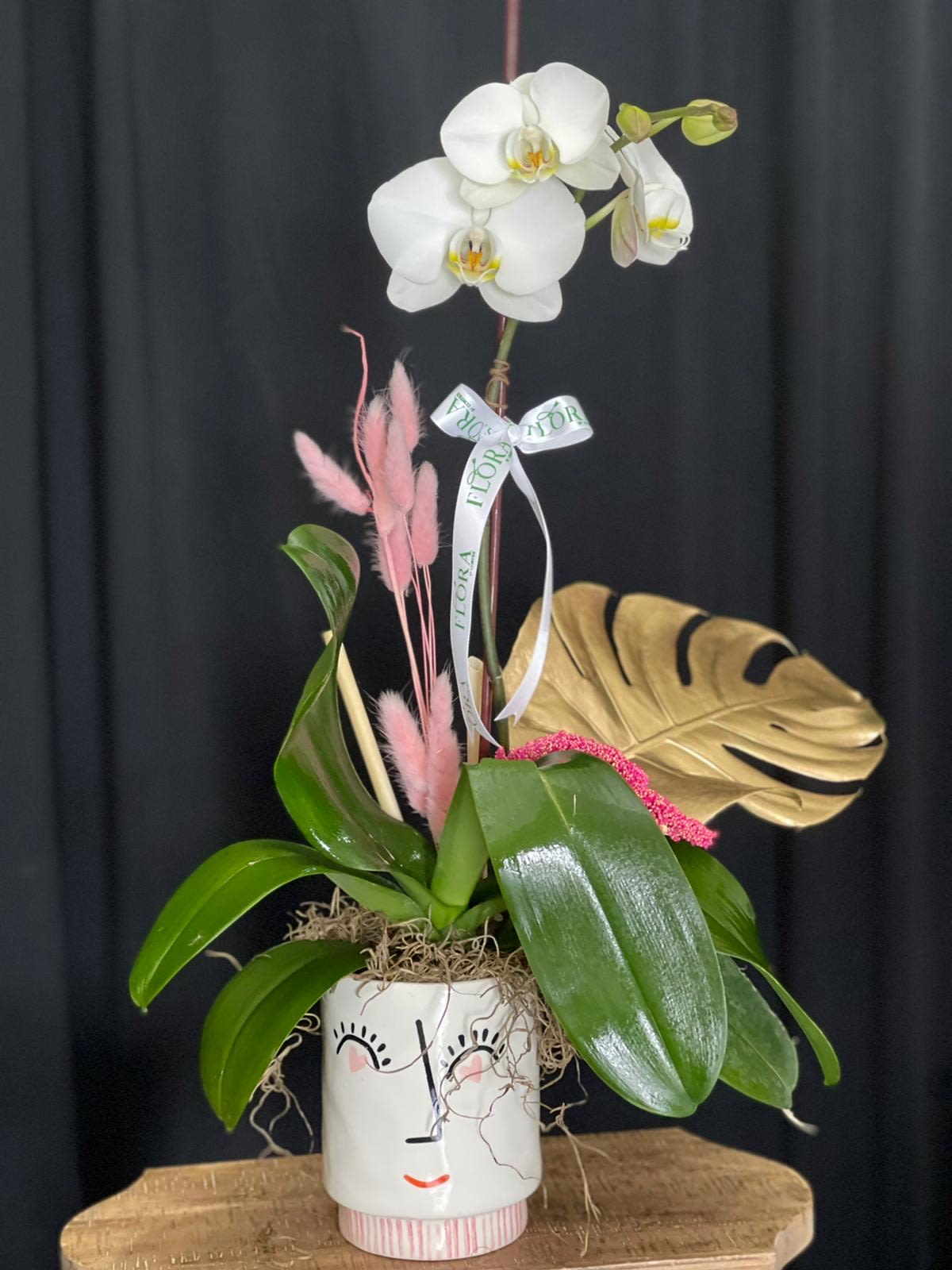 Orchid Heart Eyes Pot Orchid Heart Eyes Pot - Discover a playful pot with heart eyes, perfect for adding a touch of love and personality to your space. Ideal for plants or as a fun decor piece, this charming pot brings a whimsical vibe to any room. Perfect for gifting or brightening up your home!
