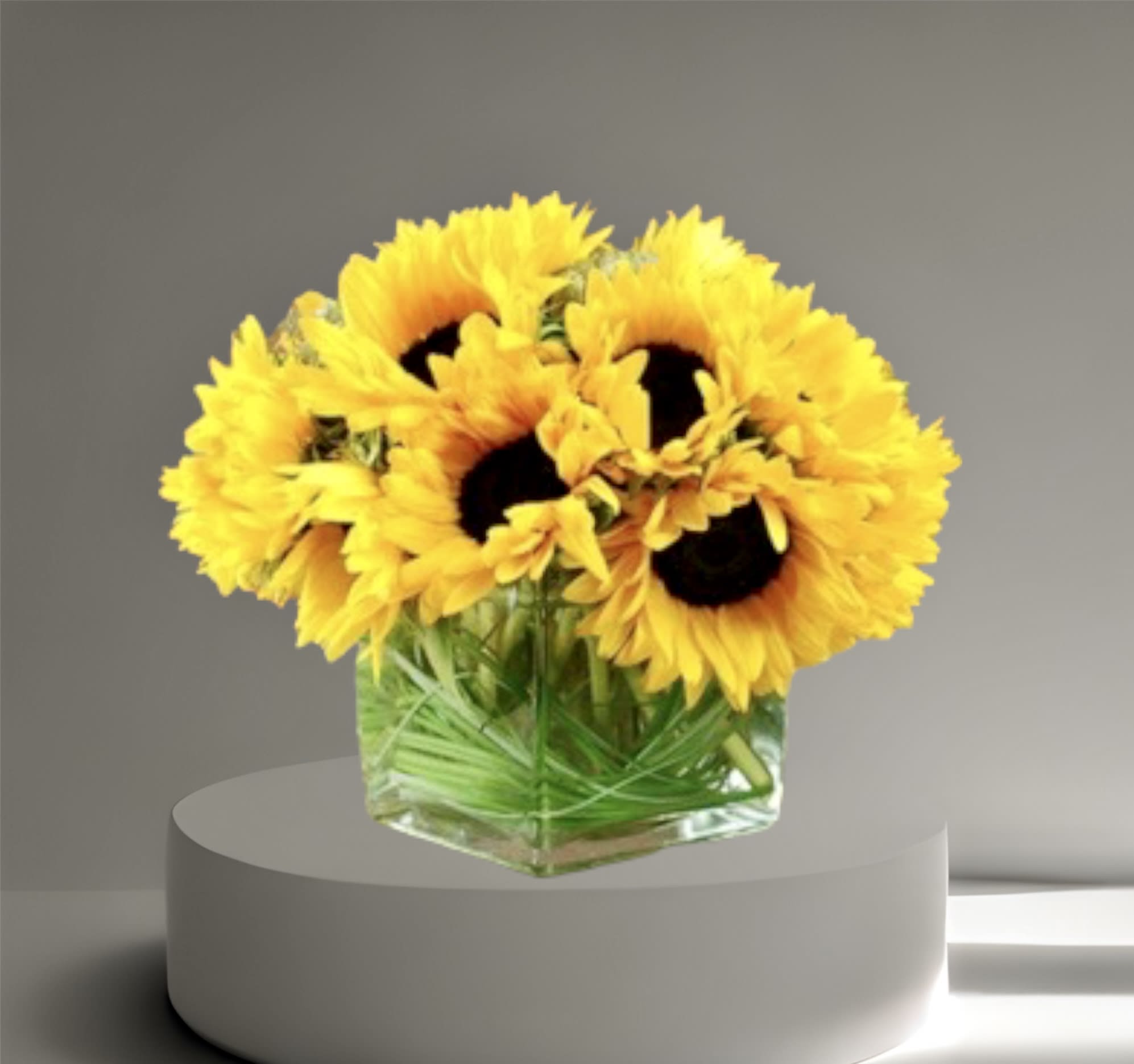 You Are My Sunshine - A best seller! Sun Flower arrangement in a glass vase, with other seasonal filler flowers to brighten even the darkest of corners. 