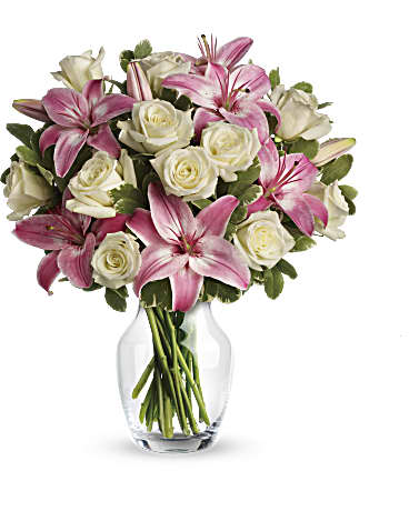 Always a Lady - She'll always be your #1 lady. Remind her just how special she is - send a sensational gift she'll never forget. This beautiful bouquet of fragrant pink lilies and lush white roses is sure to make an impression!