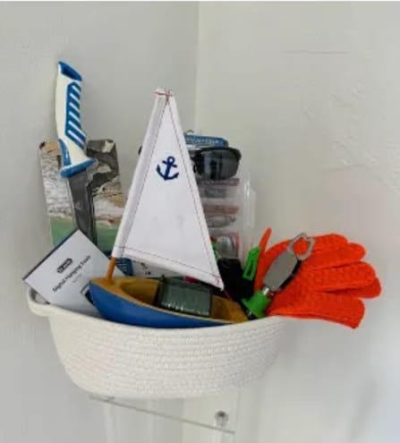 Fishing Gift Basket - Fishing line/78 lures with box/ gloves/filet knife/sun glasses/needle nose pliers and fish grippers/weigh scale/sail boat In a wooden crate