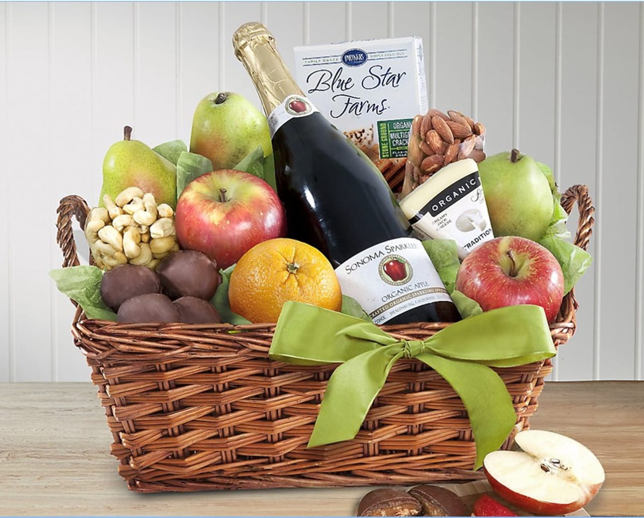 Organic Fruit & Cheese Gift Basket Organic Fruit & Cheese Gift Basket - Ah, organic! What's not to love? No pesticides, chemical fertilizers or genetically modified organisms or additives. Just sunshine, fresh air and good, healthy soil. *organic items may vary due to availability. Non alcoholic cider is included when available.