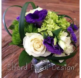Modern Grace Modern Grace - A beautiful arrangement including hydrangea, roses, lisianthus and more.