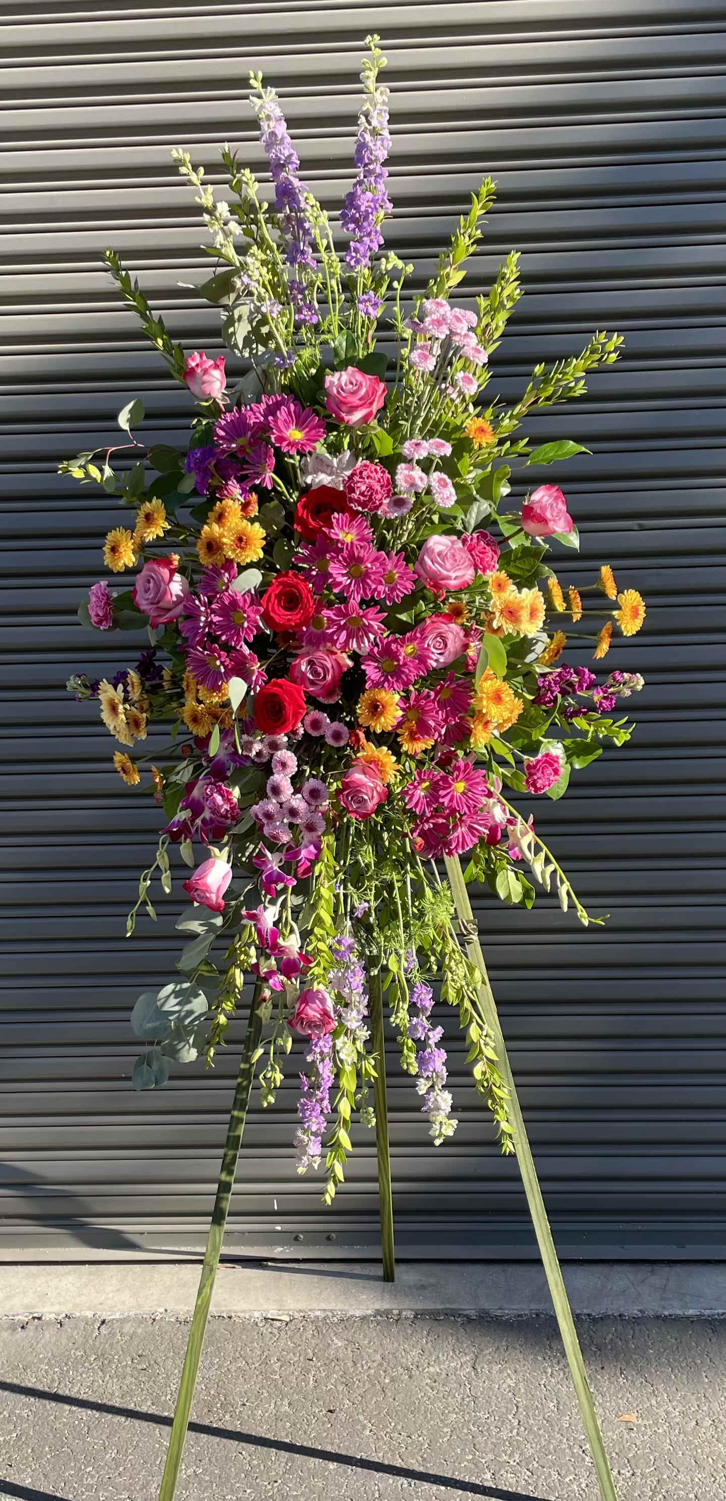 Mix Spray - A mix of flowers and colors make up this standing spray