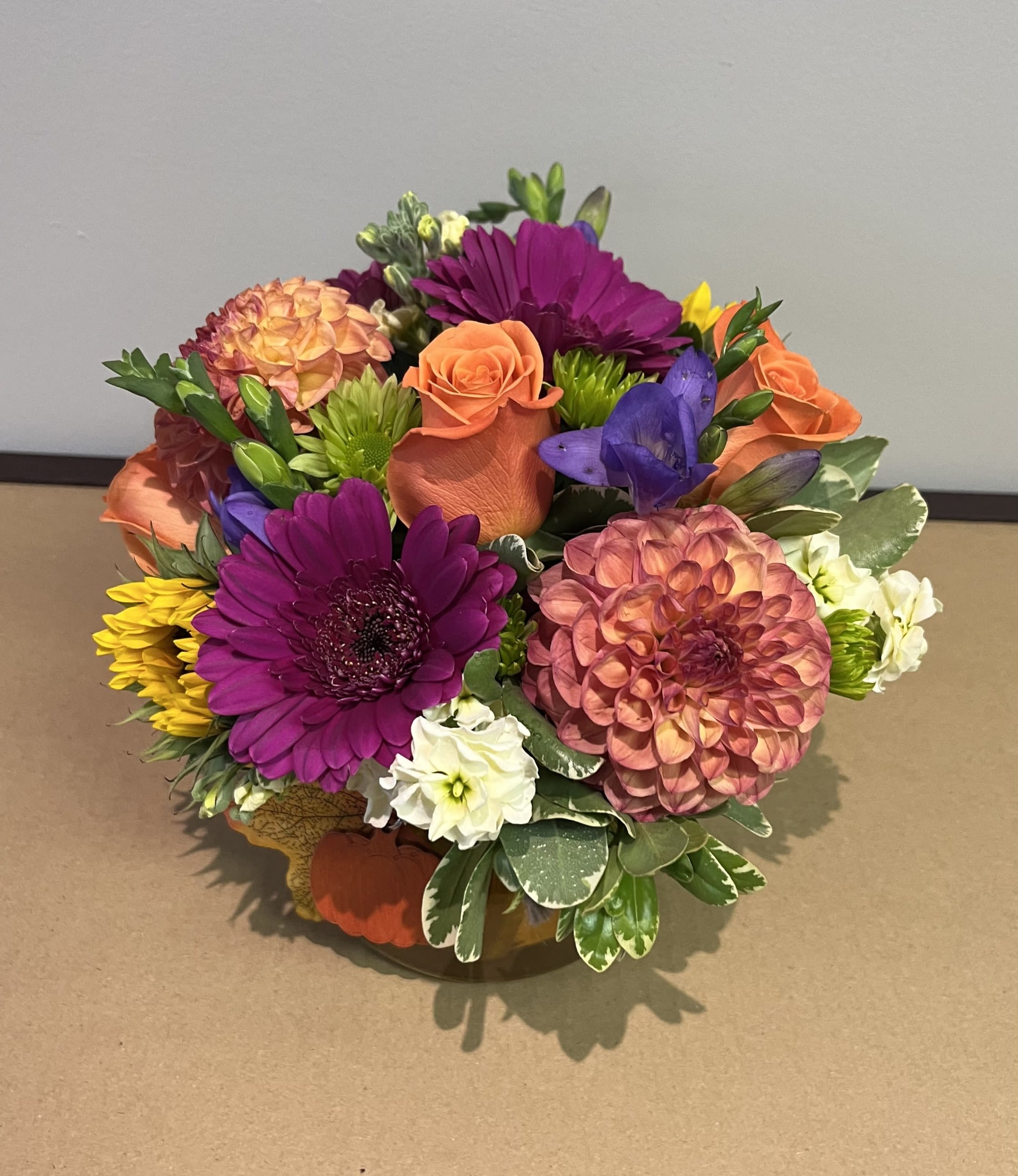 Vibrant Fall by Chasing Petals - Bold and beautiful colours make up this centerpiece, perfect for the vibrant personality in your life!