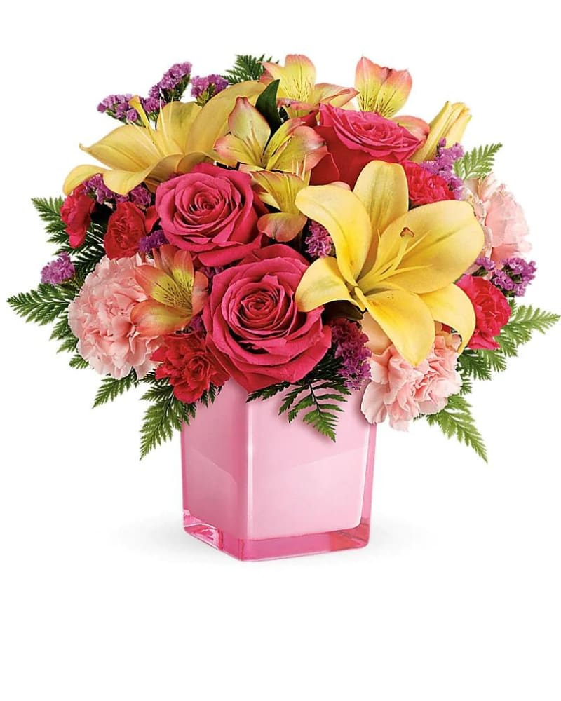 Pop Of Fun Bouquet - Pop go the petals! This festive, fun-loving mix of flowers is a cheerful gift for any occasion. Hand-delivered in our exclusive Color Splash cube, these pink roses and bright peach lilies are guaranteed to please!