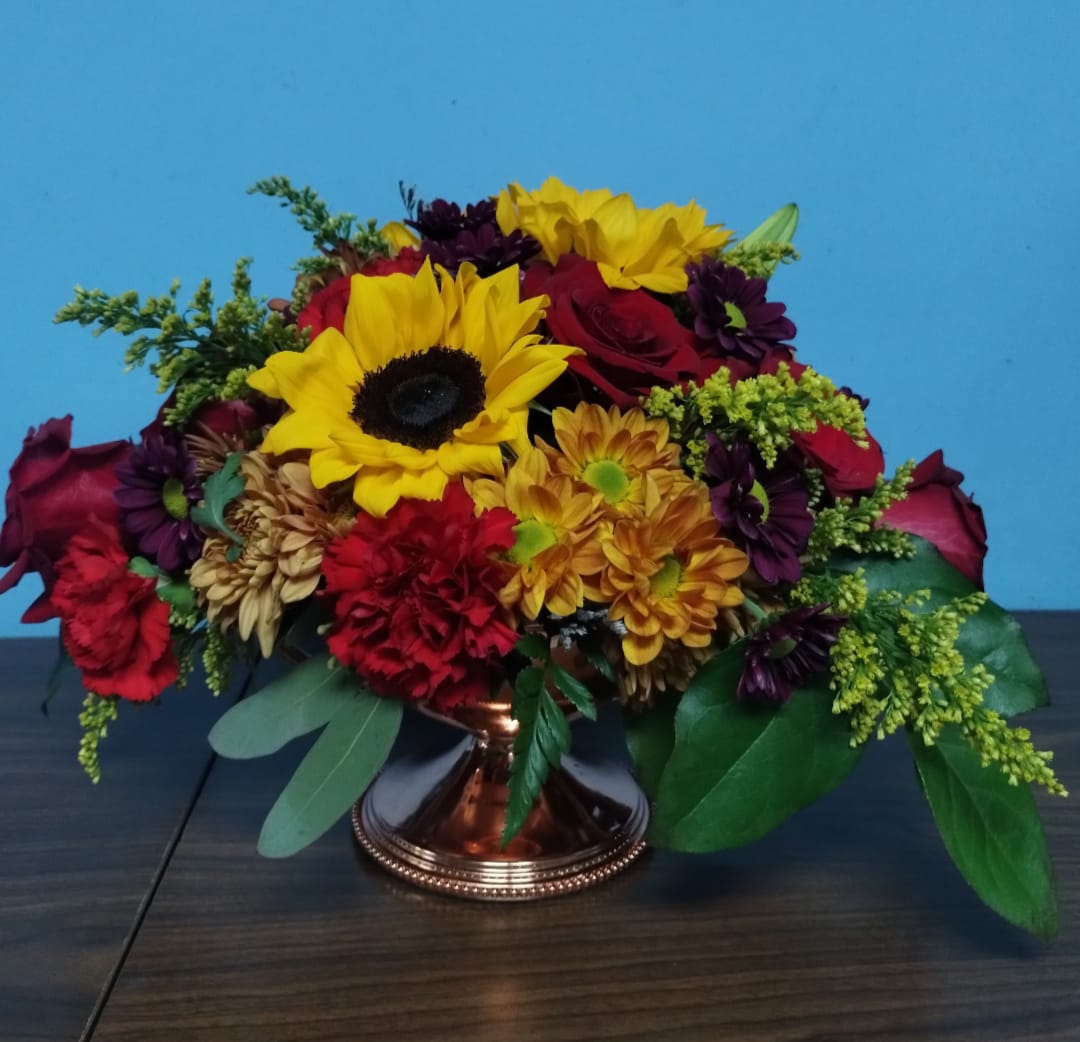 Sassy Brassy - A beautiful centerpiece in a brass color container that will be the perfect on any Thanksgiving table. 