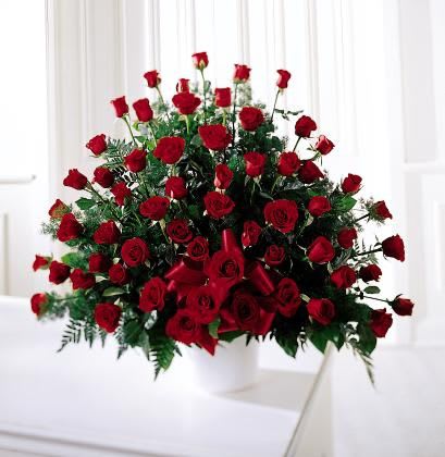 A red roses basket  - a  basket of red roses for funeral or sympathy or any other occasion