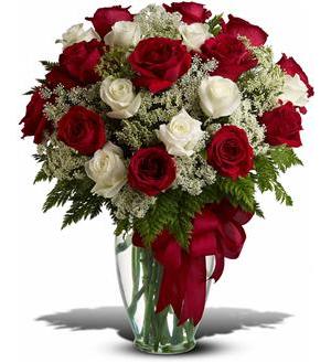 The GRAND - One Dozen Red Roses &amp; One Dozen White Roses with babies breath, mixed greenery, and bow make up this show stopper Design. 