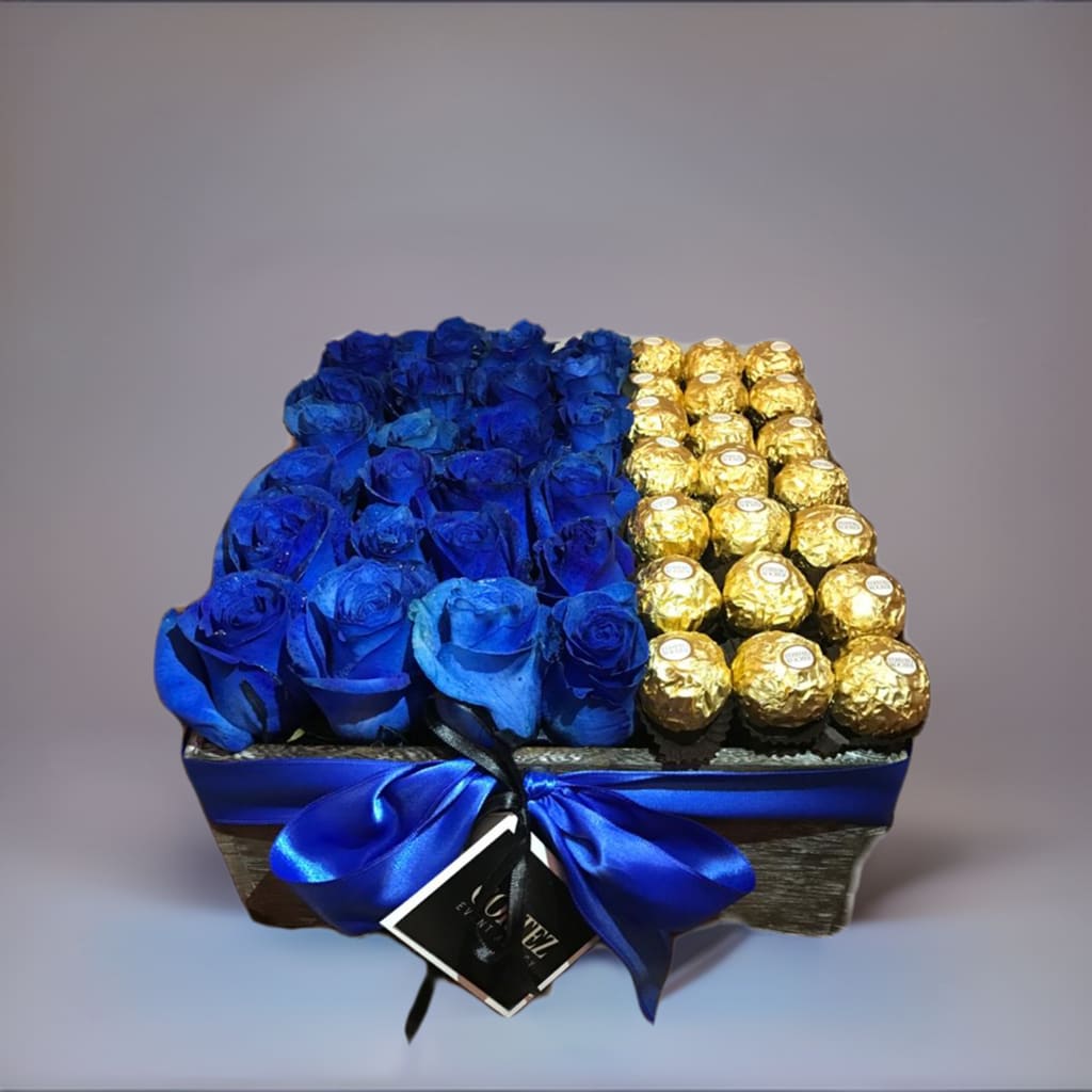 Box of Blue Roses with Ferrero Rocher Chocolate - Delightful box featuring stunning blue roses paired with luxurious Ferrero Rocher chocolates. A perfect gift for any occasion, combining elegance and sweetness in one beautiful package. Order this unique and thoughtful arrangement today!
