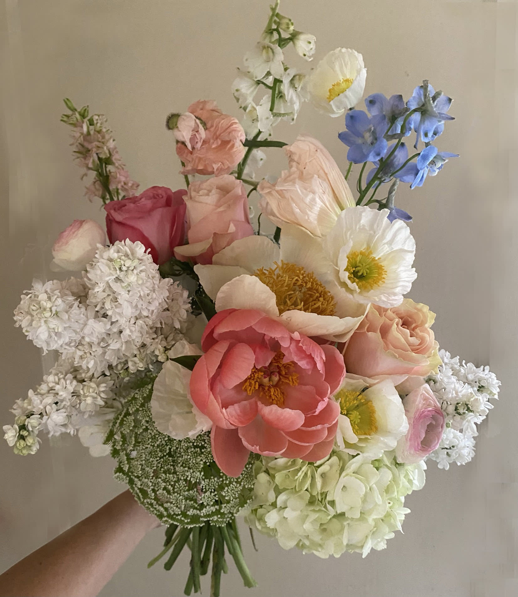 Margot bouquet - Ethereal, poetic hand tied bouquet of dreams. As light as clouds and meadows. Made of fresh, garden like stems in all the pastel colors. Poppies, Delphinium, sweet peas and/or other seasonal stems of the finest quality and colors.