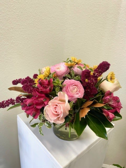 Bronzed Autumn - Beautiful Magnolia leaves with pink, crimson and sunset colored flowers.