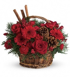 Berries and Spice Basket Berries and Spice Basket - Festive red roses, gerberas, carnations and berries are arranged to look their holiday best when mixed with cinnamon sticks and pinecones in a lovely wicker basket. It's a great way to get a handle on your holiday gift list! Approximately 14" W x 13" H