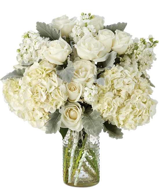 Atlantis Pearl Bouquet - This gem of a bouquet is a monochromatic masterpiece that has to be seen to be believed. Hydrangeas, fragrant stock, luxury roses, and silvery dusty miller mingle so playfully, yet show their chic sides 