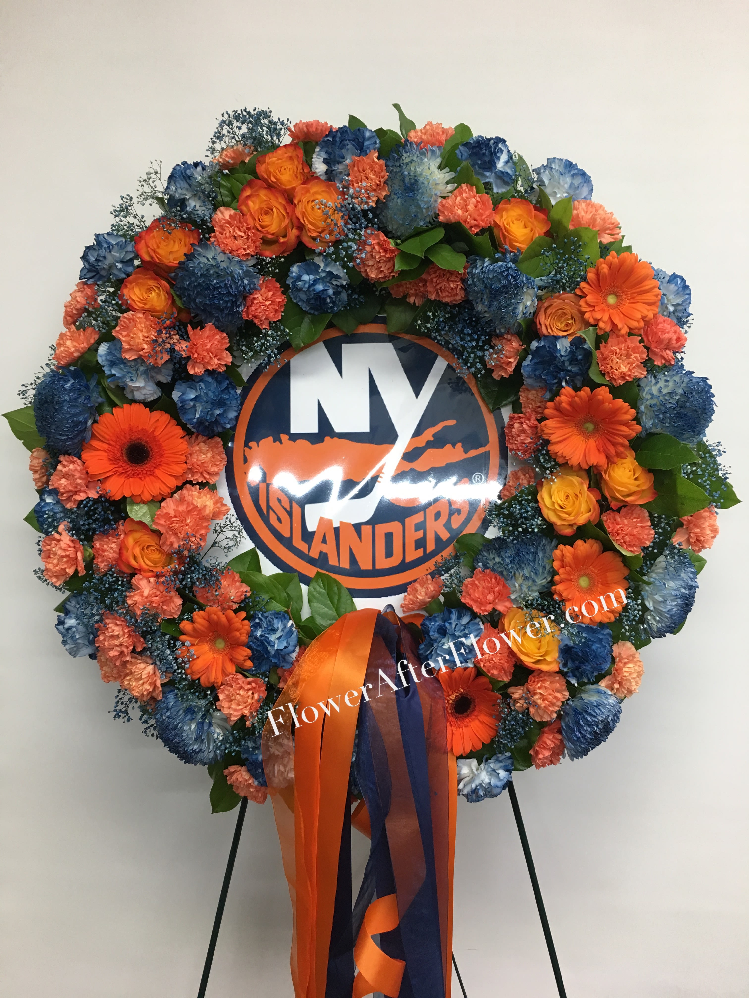 Forever An Islander’s Fan Forever An Islander’s Fan - This “uniquely ours” fan favorite sympathy tribute in honor of your #1 fan, will truly bring a smile and evoke happy memories of your loved one. Each wreath is uniquely created especially for you and will vary slightly. Also available for Mets, Yankees, Rangers, Jets, Giants