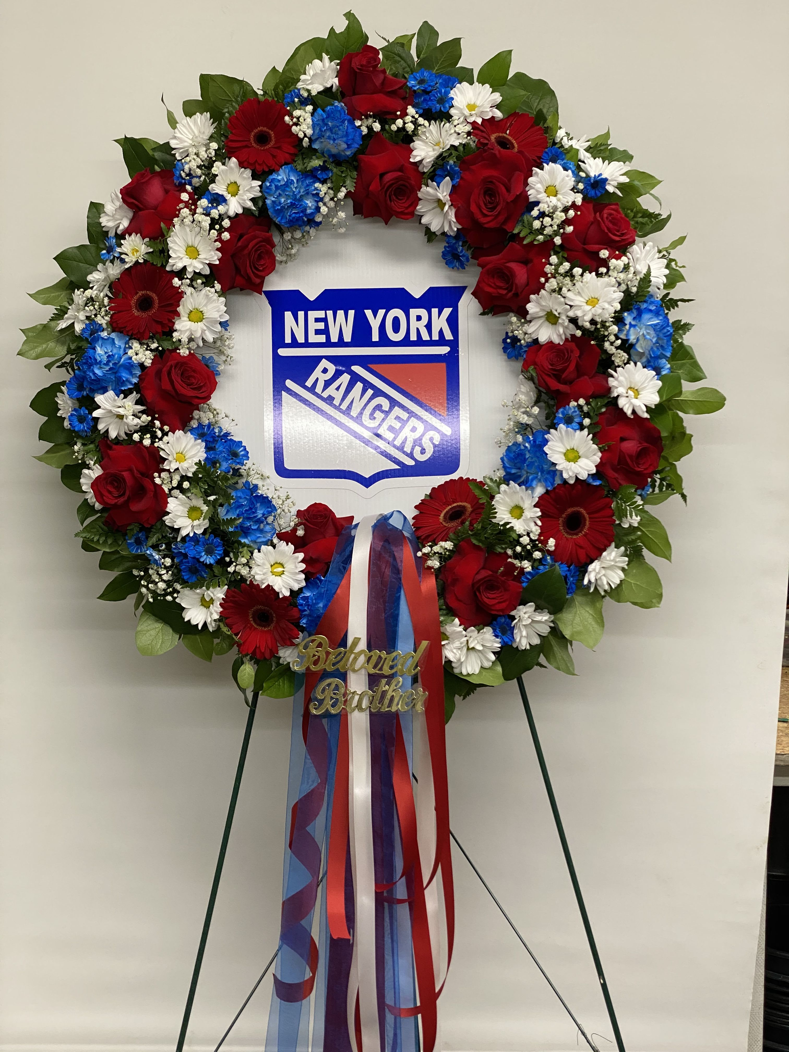 Forever A Ranger’s Fan Forever A Ranger’s Fan - This “uniquely ours” fan favorite sympathy tribute in honor of your #1 fan, will truly bring a smile and evoke happy memories of your loved one. Each wreath is uniquely created especially for you and will vary slightly. Also available for Mets, Yankees, Islanders, Jets, Giants
