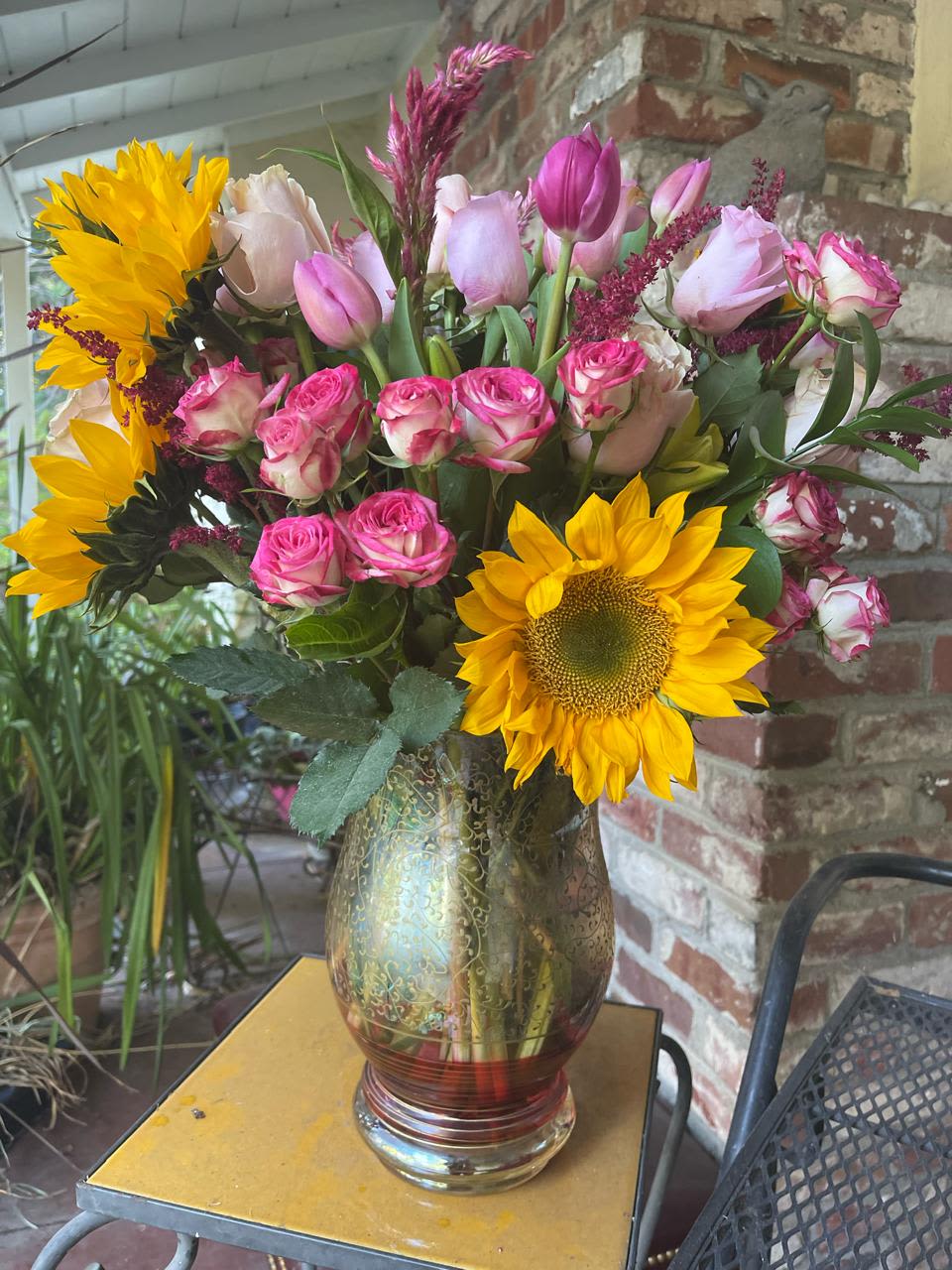 Pink Sunshine - Pink Sunshine is a vibrant and cheerful bouquet that beautifully blends the warm, golden brilliance of sunflowers with the soft, delicate hues of pink roses. Perfect for brightening any occasion, this arrangement exudes joy, warmth, and positivity, making it an ideal gift for someone special or to add a touch of sunshine to your day.