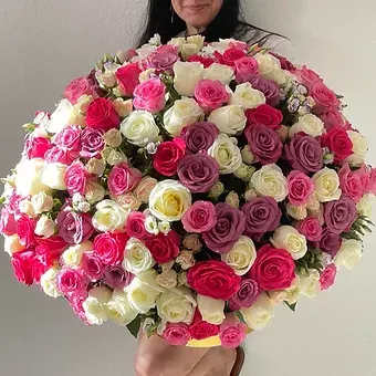 All For Yor All For Yor - Send all your love with a beautiful mounded display of roses and spray roses in all shades of pink, cremes, and lavenders in a big box lined with leaves.