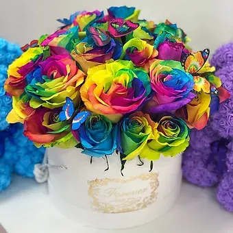 Rainbow Rainbow - A spectacular composition of rainbow roses in a box is a unique gift that amazes with its unusual and bright appearance. Each flower is painted in multicolored tones, creating a unique atmosphere of magic and joy. Give the gift of unusual emotions with such an extravagant bouquet!