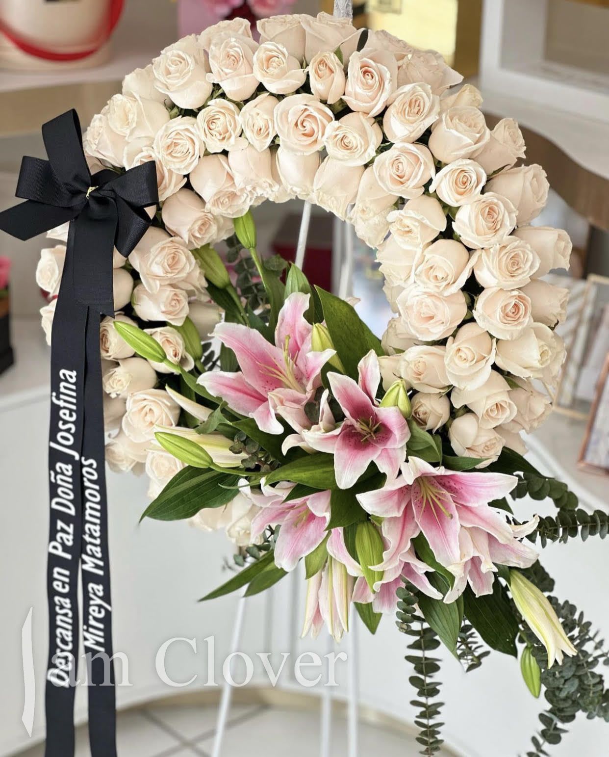 Blush Rose Wreath - This wreath is a graceful way to honor a life lived with kindness, compassion, and warmth. The subtle beauty of blush pink roses and the splash of pink lilies represent love, gratitude, and remembrance.  Fulfill your floral needs at I Am Clover in Ramona, CA, and experience the difference in quality, freshness, and care that comes with ordering locally.   Delivery: 2:30pm - 6:30pm Same Day Orders may take at least 6 hours to process and deliver Morning and Specific Delivery Time Requests:  will be charged a $15 convenience fee. Specific delivery times are acknowledged and we will do our best to accommodate, however we cannot guarantee on time delivery due to unforeseen events.  Gate Codes are mandatory for our delivery drivers to enter residential or commercial buildings. If you don’t know the gate code for a delivery, please contact the recipient and provide us with it or our driver can contact the recipient before beginning a delivery route to obtain the code. Our drivers will only wait five minutes outside the gate for a callback. If a driver has to leave a property, the delivery is reassigned for the next day and may charge an additional delivery fee. 