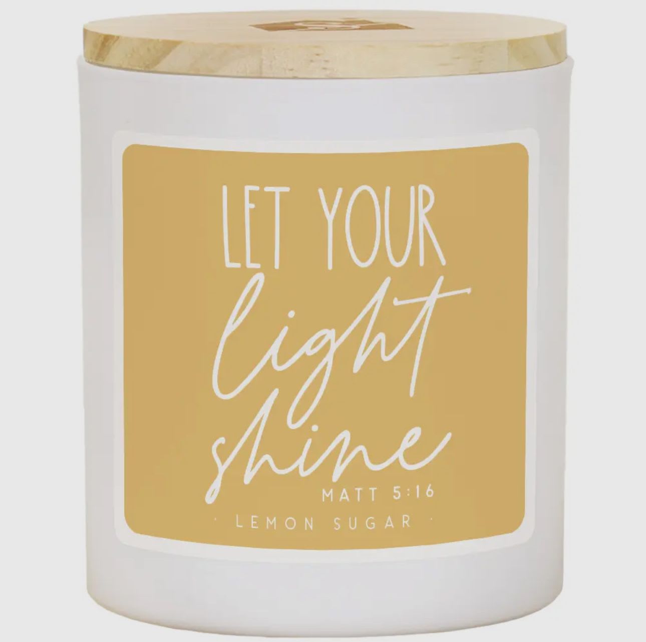 Let Your Light Shine Candle Let Your Light Shine Candle - Elevate your senses with our stunning candles adorned with unique and personalized sentiments on every label. These 11 oz soy wax, 2 wick candles offer the perfect gifts for everyone and every occasion. Dimensions 3.5" x 4.25" x 3.5" --- Text found in image: LET YOUR light shine MATT 5:16 - LEMON SUGAR Colors: White, Light Yellow, Natural Wood Additional Info: Inspirational theme - This radiant candle encompasses the essence of brightness, positivity, and inner light, instantly elevating your space with its heartwarming message and delightful lemon sugar scent. - uplifting quote, soy wax, wooden lid, home decor, gift idea, encouragement, dual wick, sensory elevation, personalized sentiment, spiritual inspiration