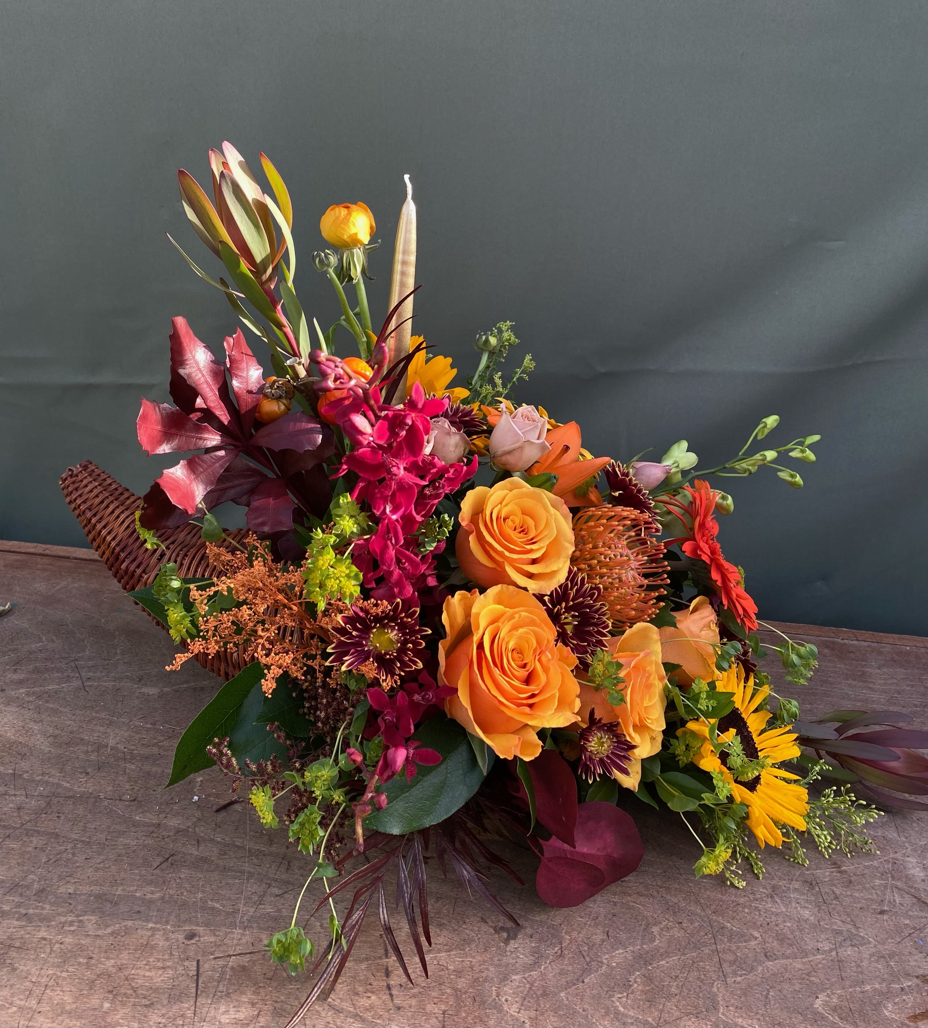 Thanksgiving Keepsake - This arrangement include a variety of fall flowers, perfect for your thanksgiving centerpiece. 