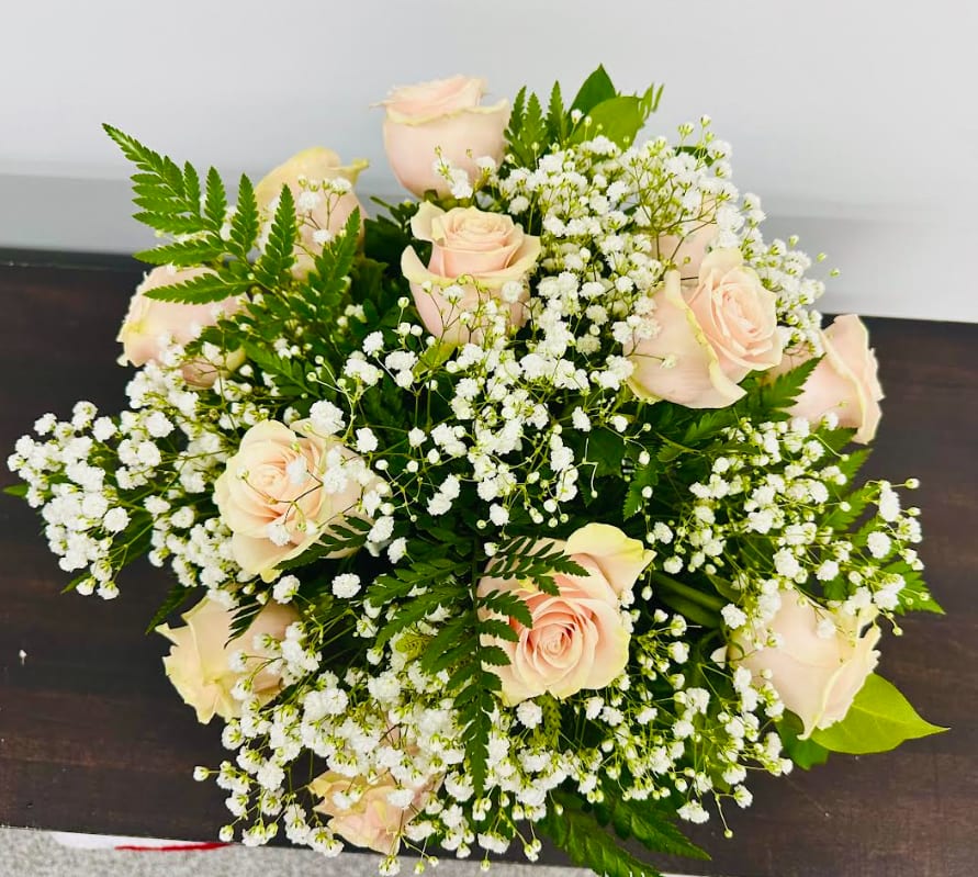 Love and Appreciation - A delicate bowl arrangement of light pink roses with babies breath for your special someone.   *Deluxe pictured.  
