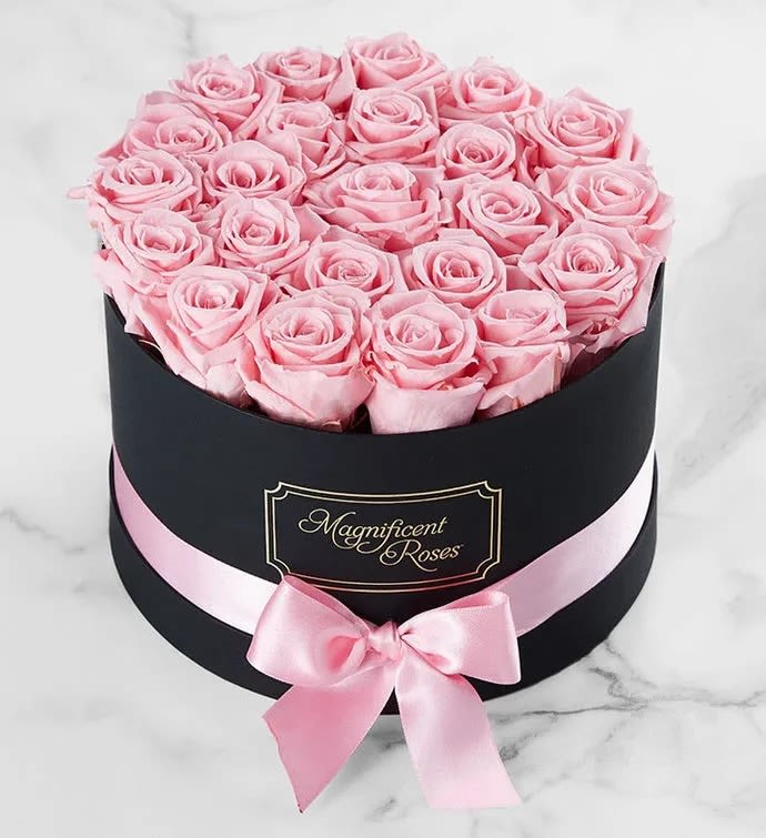 Preserved Pink Roses - Graceful, elegant, charming – our pink preserved roses convey romance beautifully. Exclusively designed for 1800Flowers, our genuine pink roses are selected for their size and perfection, carefully preserved to maintain their exquisite beauty, and artfully arranged in a round, decorative box. It’s a gift of sophistication and luxury meant for one who is truly magnificent!
