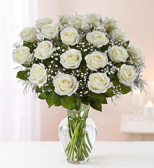 Long Stem White Roses Long Stem White Roses - Our striking long stem white roses are the ultimate way to show you care. Two, three or four dozen pure white blooms are artistically arranged by our expert florists inside an elegant glass vase and personally hand-delivered to help you express how you feel straight from the heart.