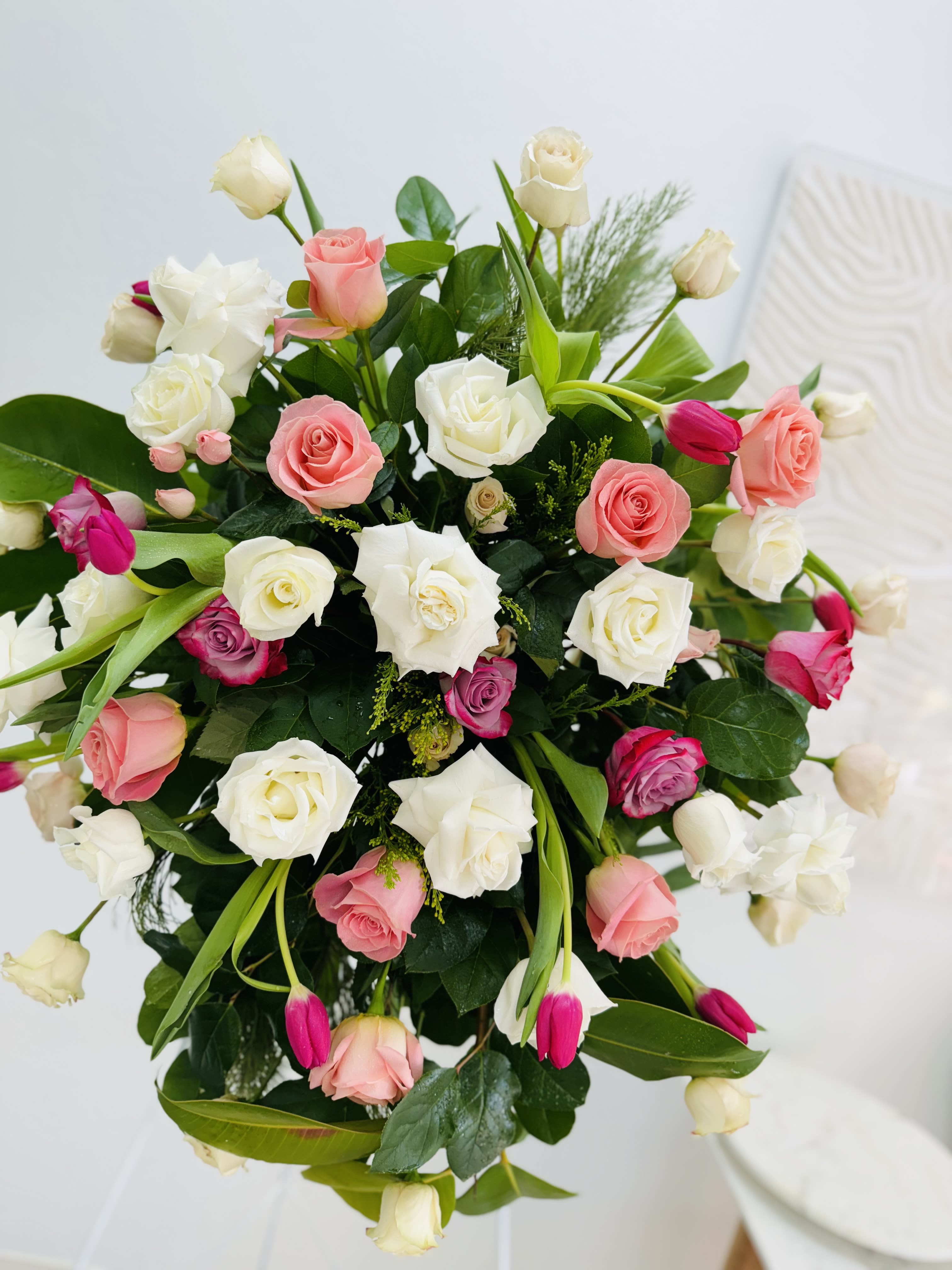 Pink and White Spray  -  and pink standing spray, lovingly crafted by I am Clover, your local florist in Ramona, California, offers a tender expression of peace and serenity. Featuring a graceful arrangement of blooms in soft white and blush pink, this spray honors your loved one with timeless beauty, providing comfort and elegance for a heartfelt final farewell. Comes in 3 sizes  Small 18-20 inch  Medium 22-26 inch  Large 27-32 inch 