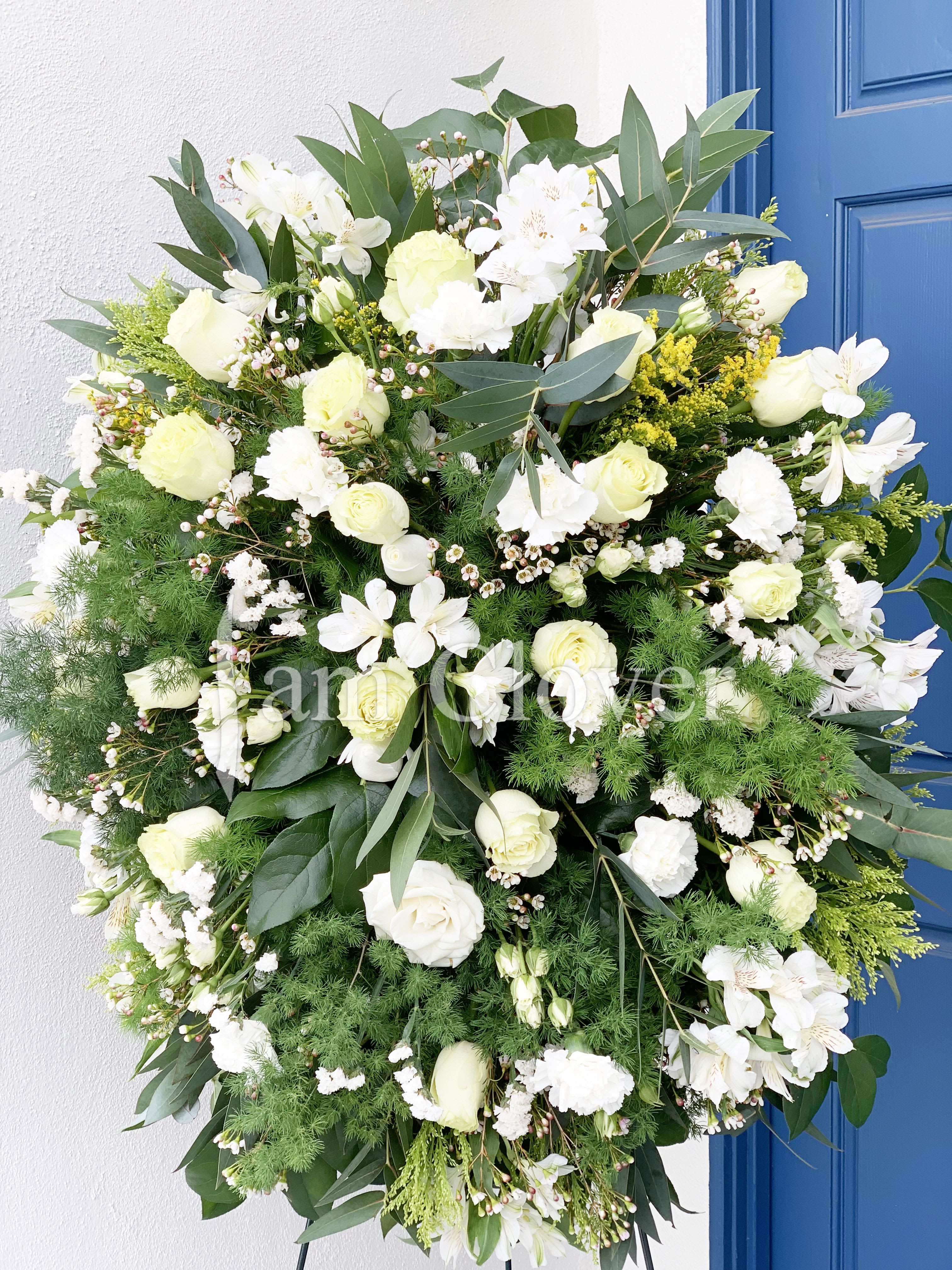 White Round Standing Spray - An elegant tribute!  Sizes: Small  18-20 inch,  Medium 24-25 inch,  Large 28-29 inch  Fulfill your floral needs at I Am Clover in Ramona, CA, and experience the difference in quality, freshness, and care that comes with ordering locally.   Disclosure: Occasional substitutions of flowers and/or containers happen due to weather, seasonality and market conditions. We will ensure that the style, theme and color scheme of your arrangement is preserved and will only substitute items of equal value or higher value.  Delivery: 2:30pm - 6:30pm Same Day Orders may take at least 6 hours to process and deliver Morning and Specific Delivery Time Requests:  will be charged a $15 convenience fee. Specific delivery times are acknowledged and we will do our best to accommodate, however we cannot guarantee on time delivery due to unforeseen events.  Gate Codes are mandatory for our delivery drivers to enter residential or commercial buildings. If you don’t know the gate code for a delivery, please contact the recipient and provide us with it or our driver can contact the recipient before beginning a delivery route to obtain the code. Our drivers will only wait five minutes outside the gate for a callback. If a driver has to leave a property, the delivery is reassigned for the next day and may charge an additional delivery fee.   Thank you!