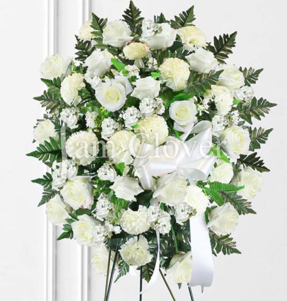 White Cluster Spray - An elegant and serene tribute, designed to convey purity, peace, and solemn respect.   Fulfill your floral needs at I Am Clover in Ramona, CA, and experience the difference in quality, freshness, and care that comes with ordering locally.   Disclosure: In some instances, our photo may represent an overall look and include a one-of-a-kind vase which cannot be exactly replicated. Occasional substitutions of flowers and/or containers happen due to weather, seasonality and market conditions. We will ensure that the style, theme and color scheme of your arrangement is preserved and will only substitute items of equal value or higher value.  Delivery: 2:30pm - 6:30pm Same Day Orders may take at least 6 hours to process and deliver Morning and Specific Delivery Time Requests:  will be charged a $15 convenience fee. Specific delivery times are acknowledged and we will do our best to accommodate, however we cannot guarantee on time delivery due to unforeseen events.  Gate Codes are mandatory for our delivery drivers to enter residential or commercial buildings. If you don’t know the gate code for a delivery, please contact the recipient and provide us with it or our driver can contact the recipient before beginning a delivery route to obtain the code. Our drivers will only wait five minutes outside the gate for a callback. If a driver has to leave a property, the delivery is reassigned for the next day and may charge an additional delivery fee.   Thank you! 