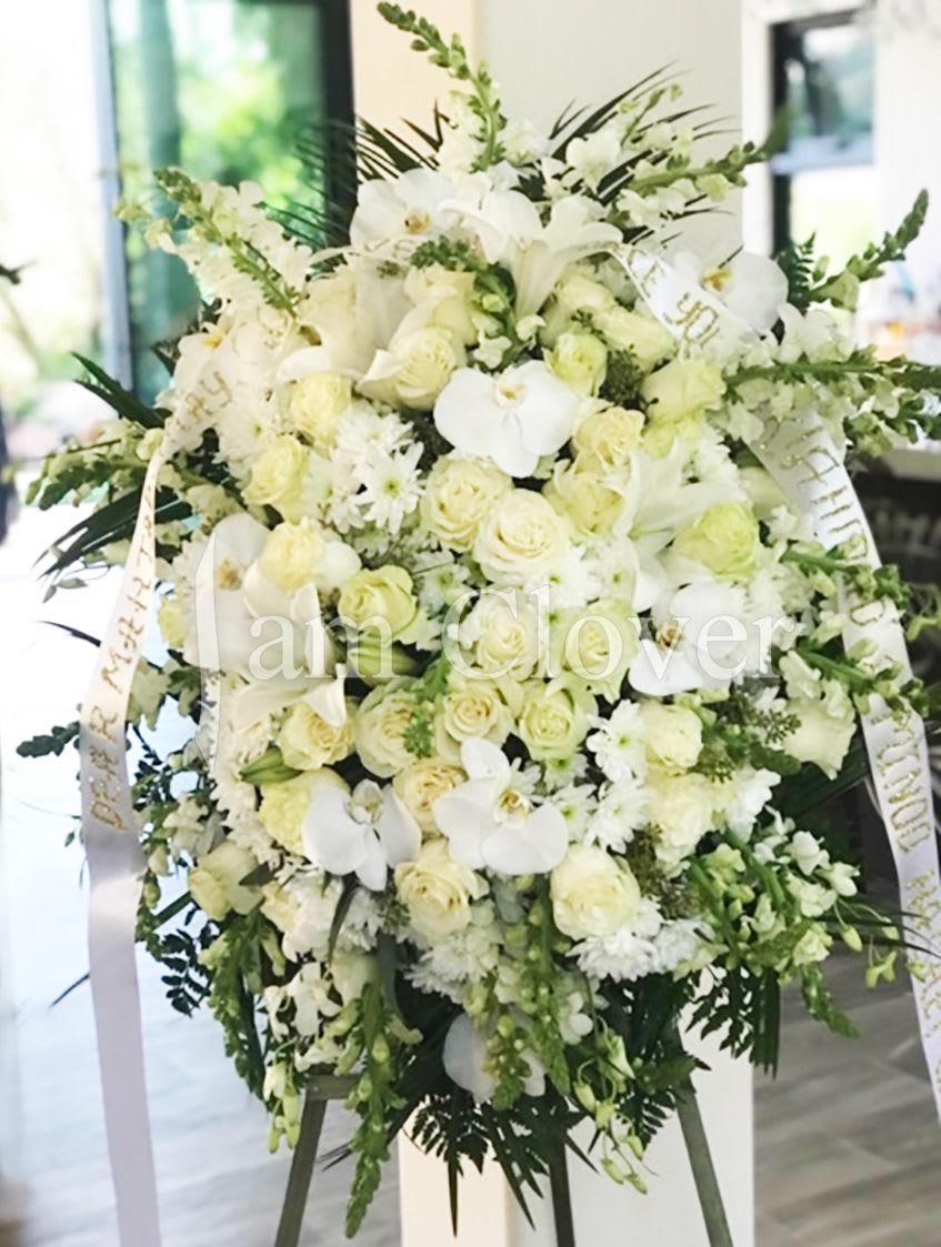 White Rose &amp; Orchid Standing Spray - An elegant and sophisticated spray, blending the timeless beauty of white roses with the exotic allure of orchids.   Fulfill your floral needs at I Am Clover in Ramona, CA, and experience the difference in quality, freshness, and care that comes with ordering locally.   Delivery: 2:30pm - 6:30pm Same Day Orders may take at least 6 hours to process and deliver Morning and Specific Delivery Time Requests:  will be charged a $15 convenience fee. Specific delivery times are acknowledged and we will do our best to accommodate, however we cannot guarantee on time delivery due to unforeseen events.  Gate Codes are mandatory for our delivery drivers to enter residential or commercial buildings. If you don’t know the gate code for a delivery, please contact the recipient and provide us with it or our driver can contact the recipient before beginning a delivery route to obtain the code. Our drivers will only wait five minutes outside the gate for a callback. If a driver has to leave a property, the delivery is reassigned for the next day and may charge an additional delivery fee.   Thank you! 