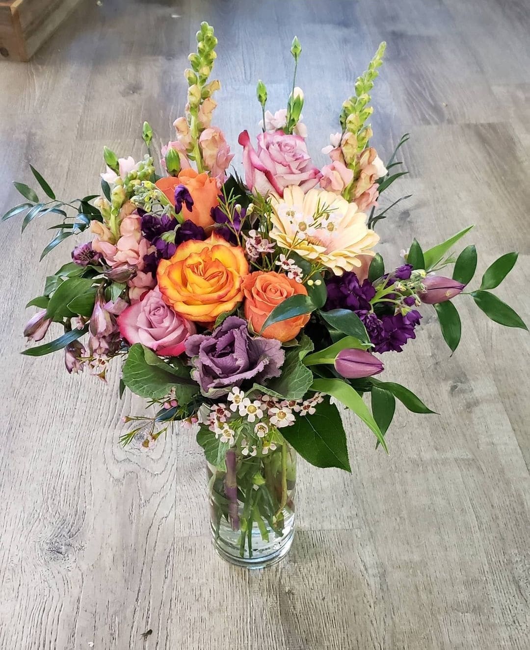 A spring mix  - A spring mix pastel blooms w some roses. Picture is a premium size. 