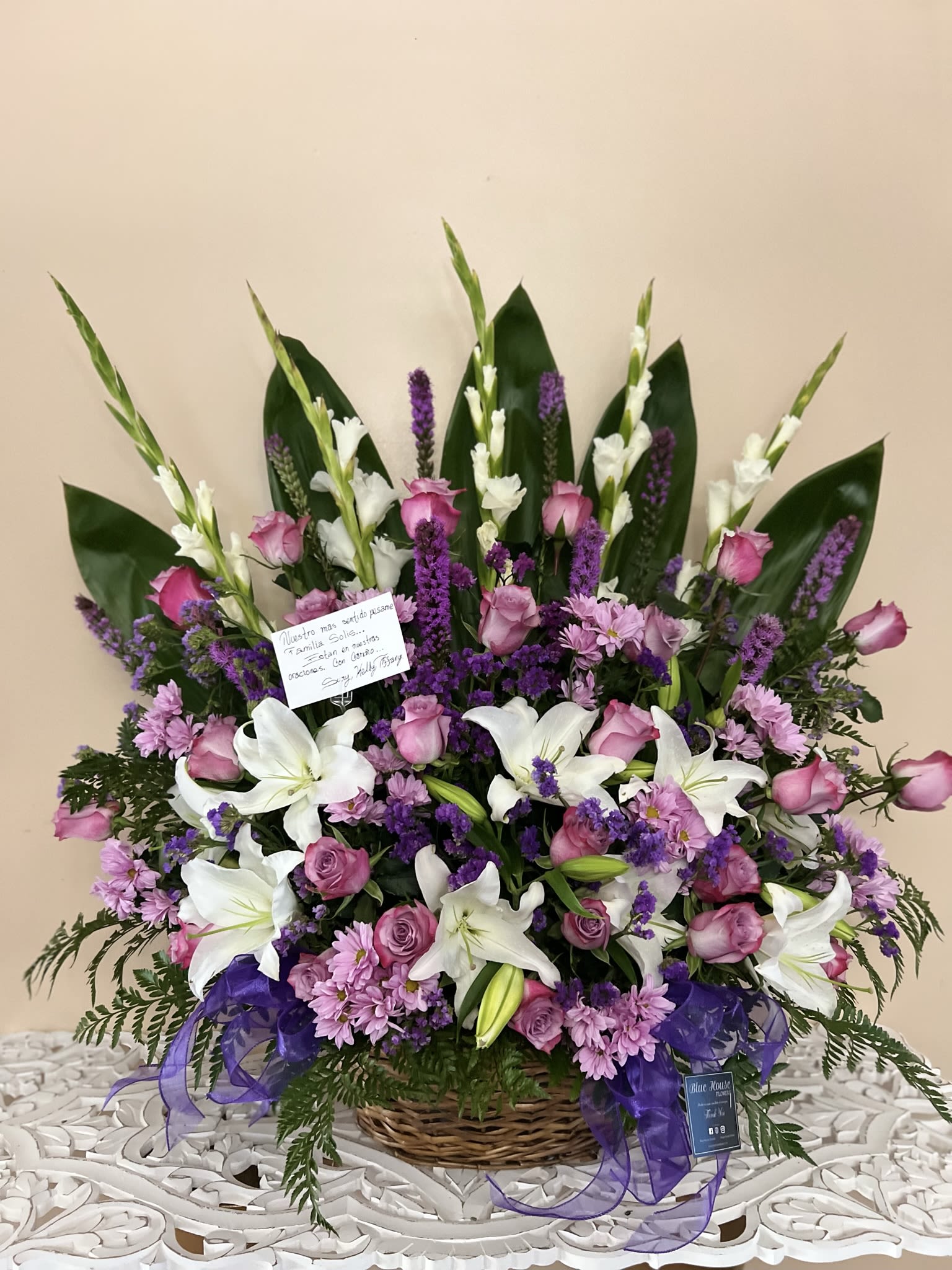 Lavander Basket Lavander Basket - Floral arrangement, contains lilies, snapdragon, statice, 24 purple roses and follers 30" x 24