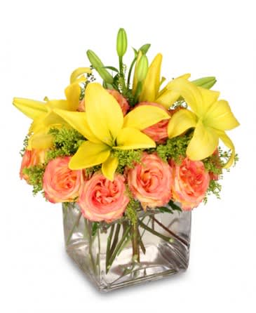 Have A Lovely Day! - Brighten her day with sunny yellow lilies, and yellow and pink roses this Mother’s Day. She'll feel extra special when this arrangement arrives on Mother’s Day. Call to send fresh flowers today! 